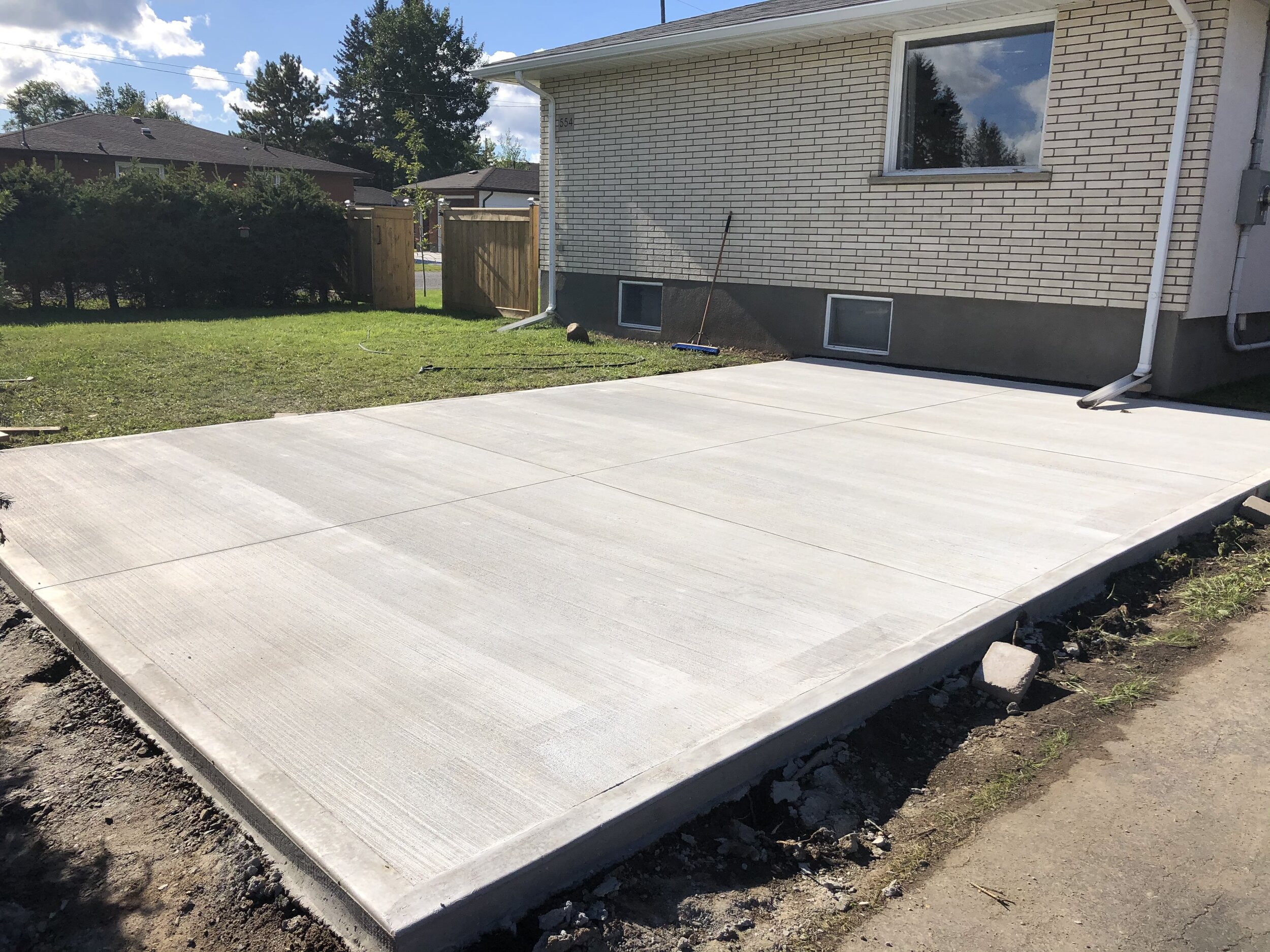 Poured Concrete Patio with a broom finish