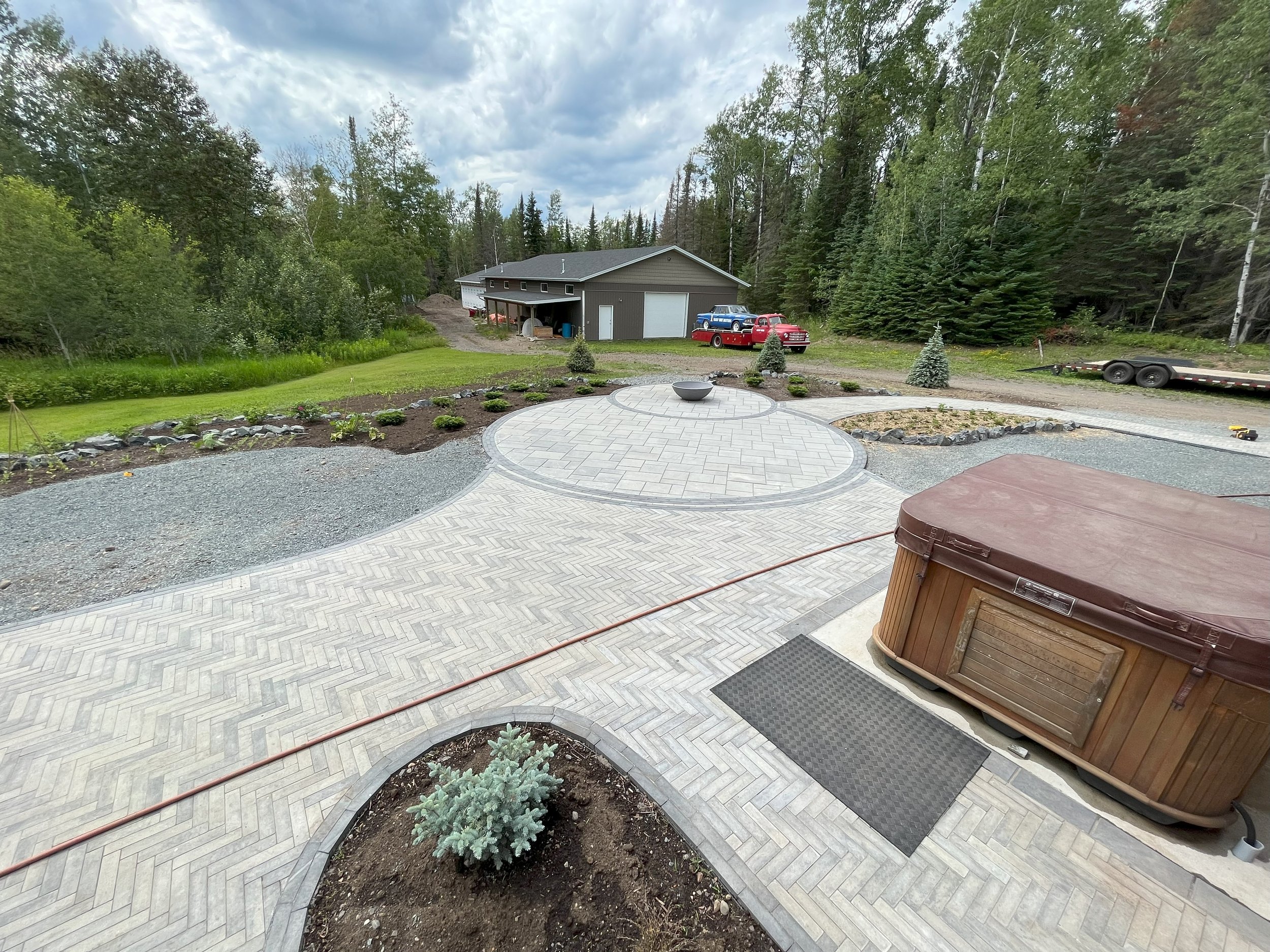 Techo Bloc Westmount Pavers into a Blu Paver Patio with Fire Bowl