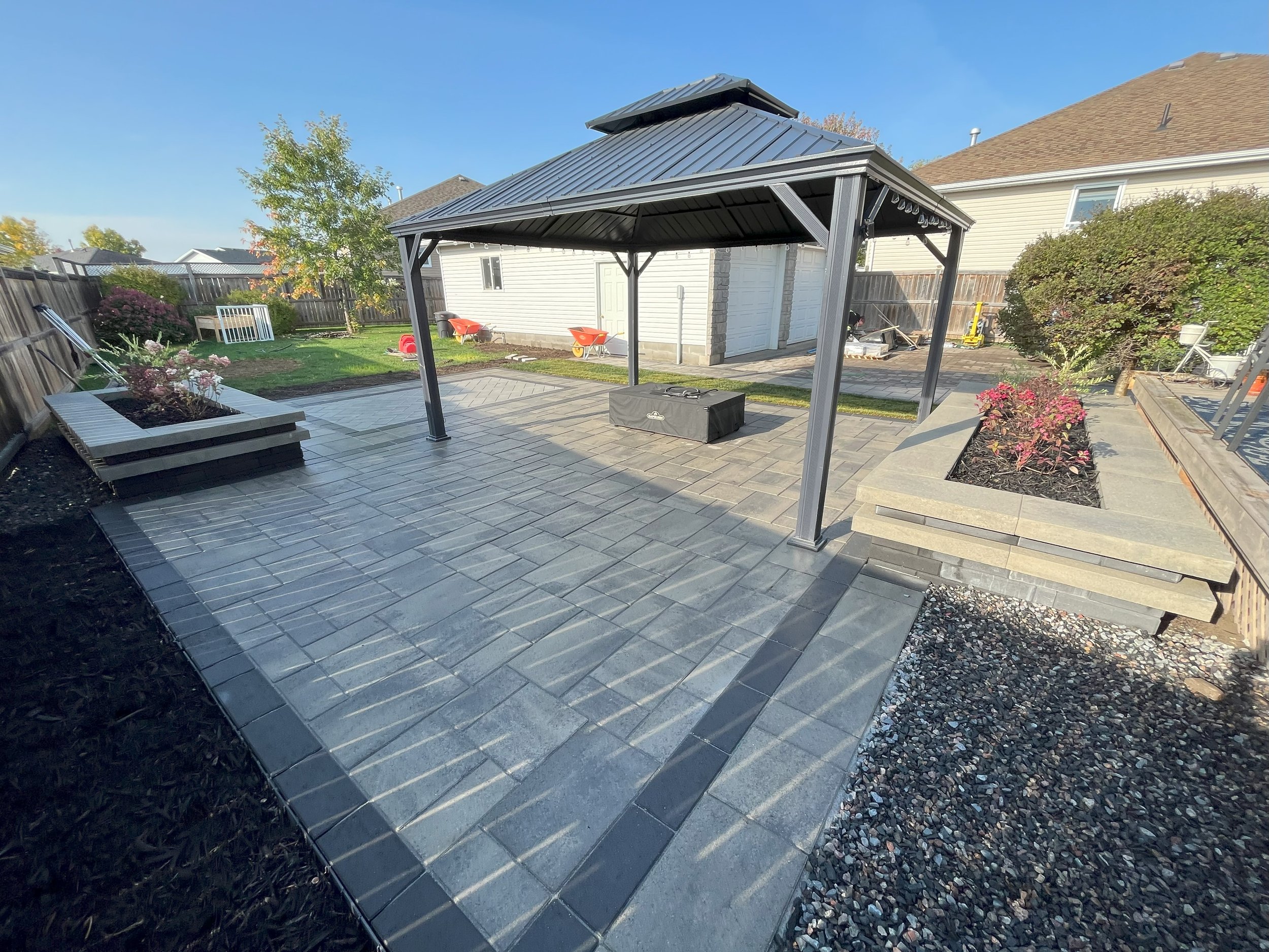 This Beautiful Patio was totally designed by Pour Boys using the best rendering software available. From design to Construction - we're Thunder Bay's Best.