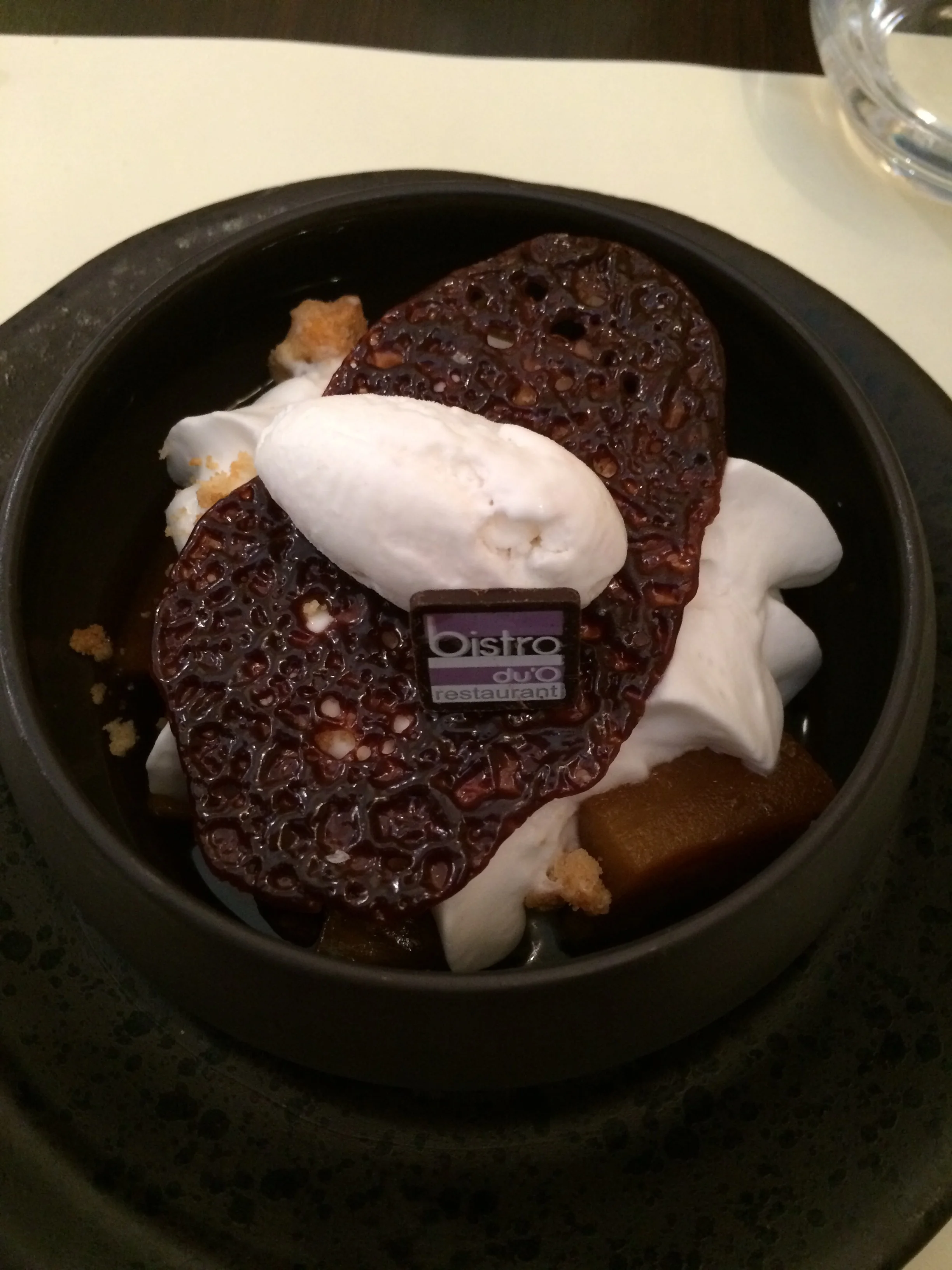 Pineapple cooked with a carmelized syrup, coconut mousse and coconut ice cream