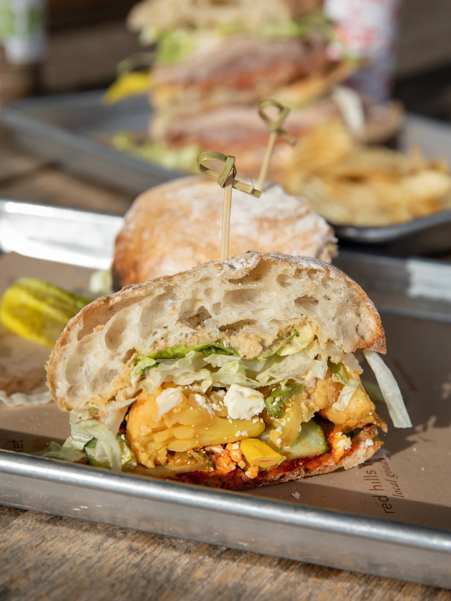 Show a little love for our veggie muffaletta deluxe!

Giardiniera (house pickled veggie mix), garlic confit hummus, spicy piquillo relish, marinated briar rose cheese, olives, fresh cucumbers, crunchy lettuce.

#redhillsmarket #dundeeoregon #oregonwi