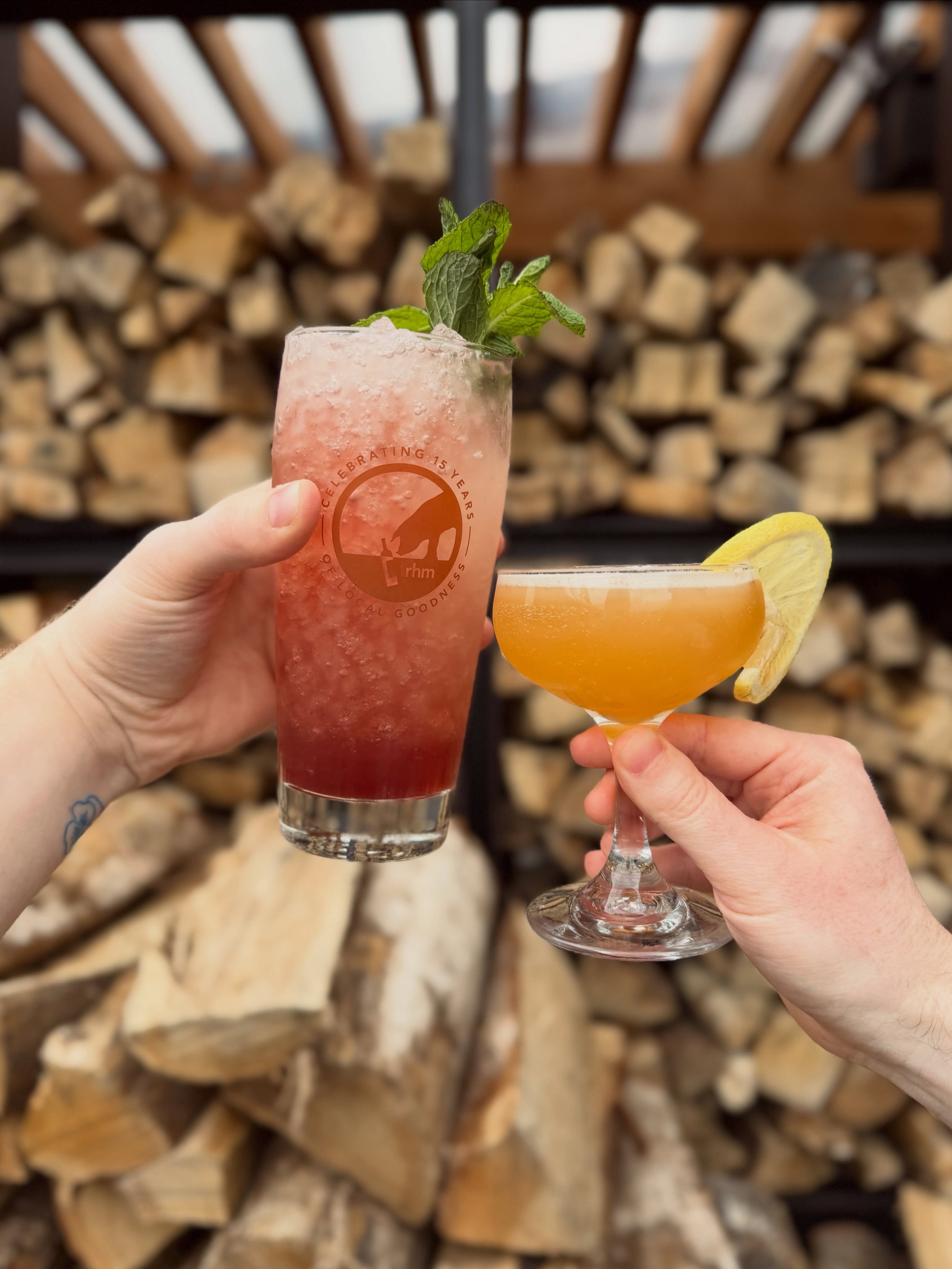 April showers bring new May cocktails 🌸🌦️🥂

pearls &amp; blundstones: empress gin, st germain, lemon (right)

bramble berry: ria gin, lemon, simple, cream de chassis, soda. served on the rocks (left