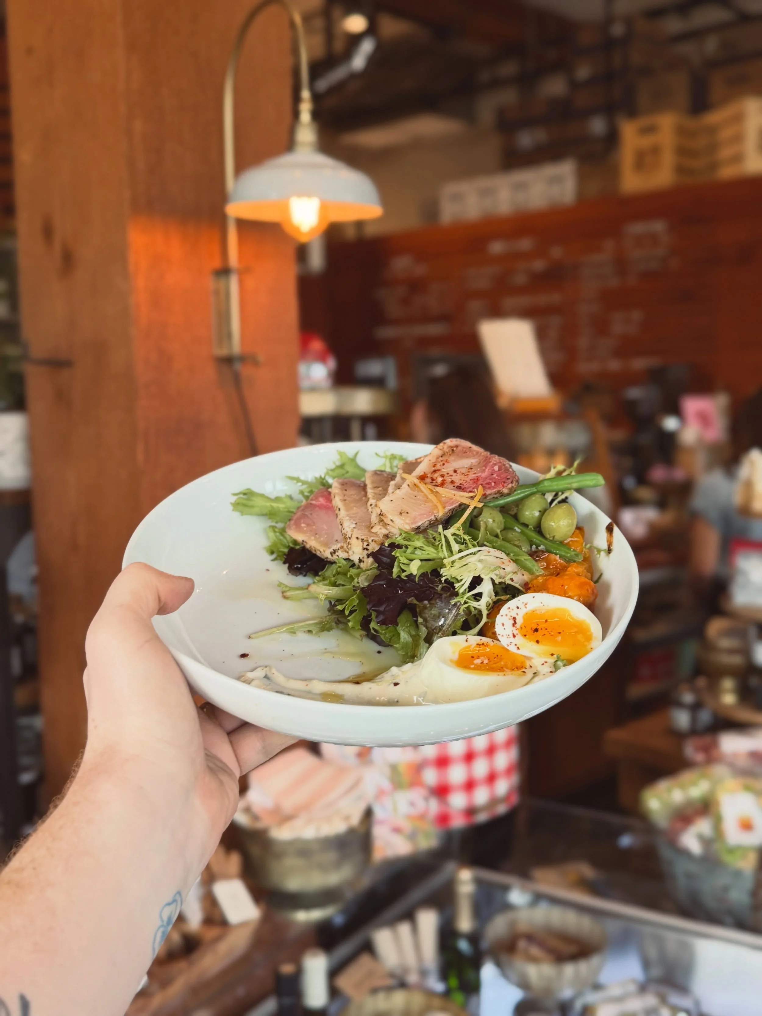 It&rsquo;s back!

yellowtail tuna nicoise with seared tuna, egg, crunchy greens, haricot verts, nicoise &amp; castelvetrano olives, preserved lemon, dill aioli, blistered and marinated cherry tomatoes