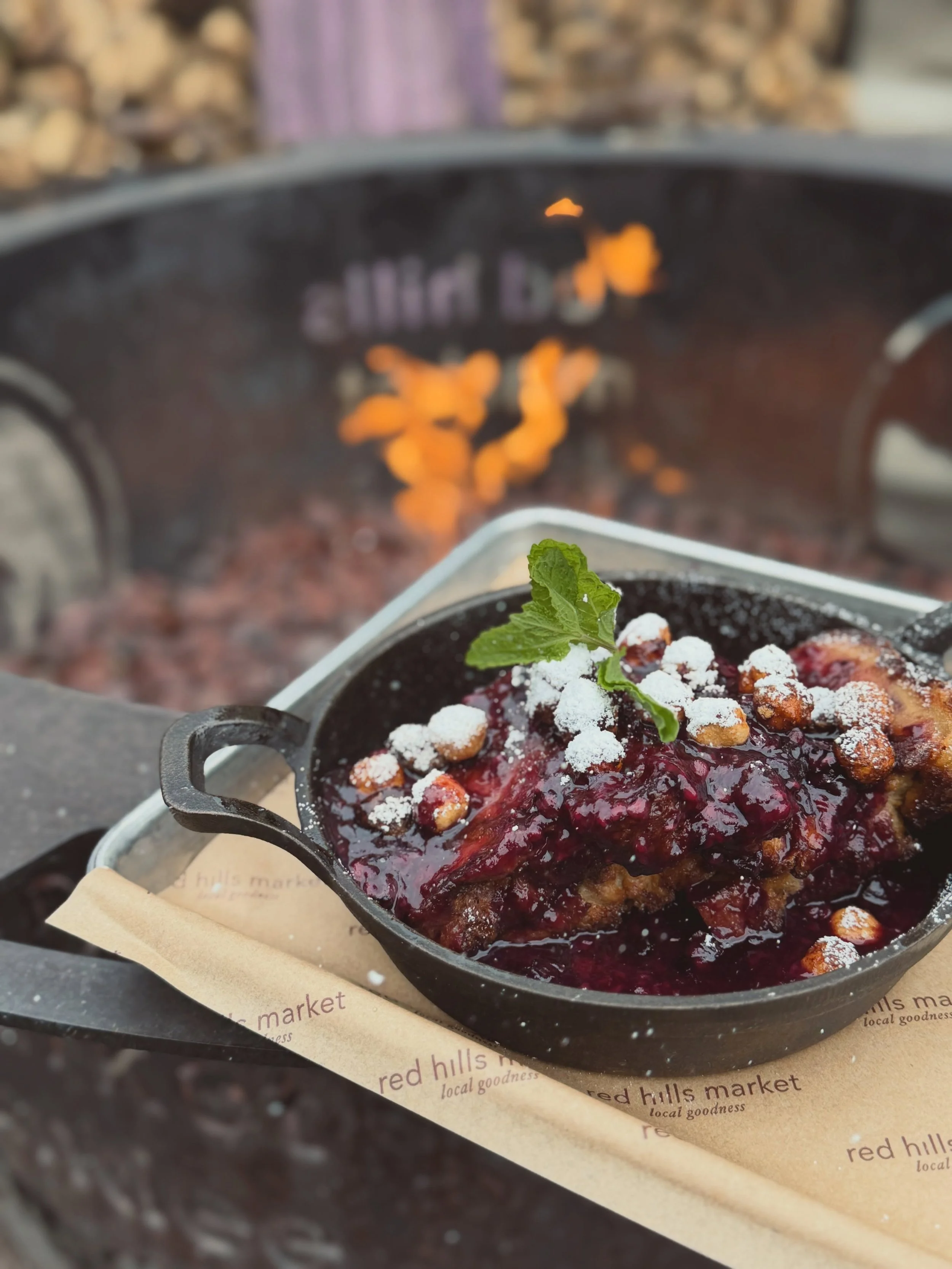 A new classic: wood-fired bread pudding french toast

Finished with seasonal berries, powdered sugar, and candied hazelnuts. Warm, crisp edges with a soft center in all the right ways.