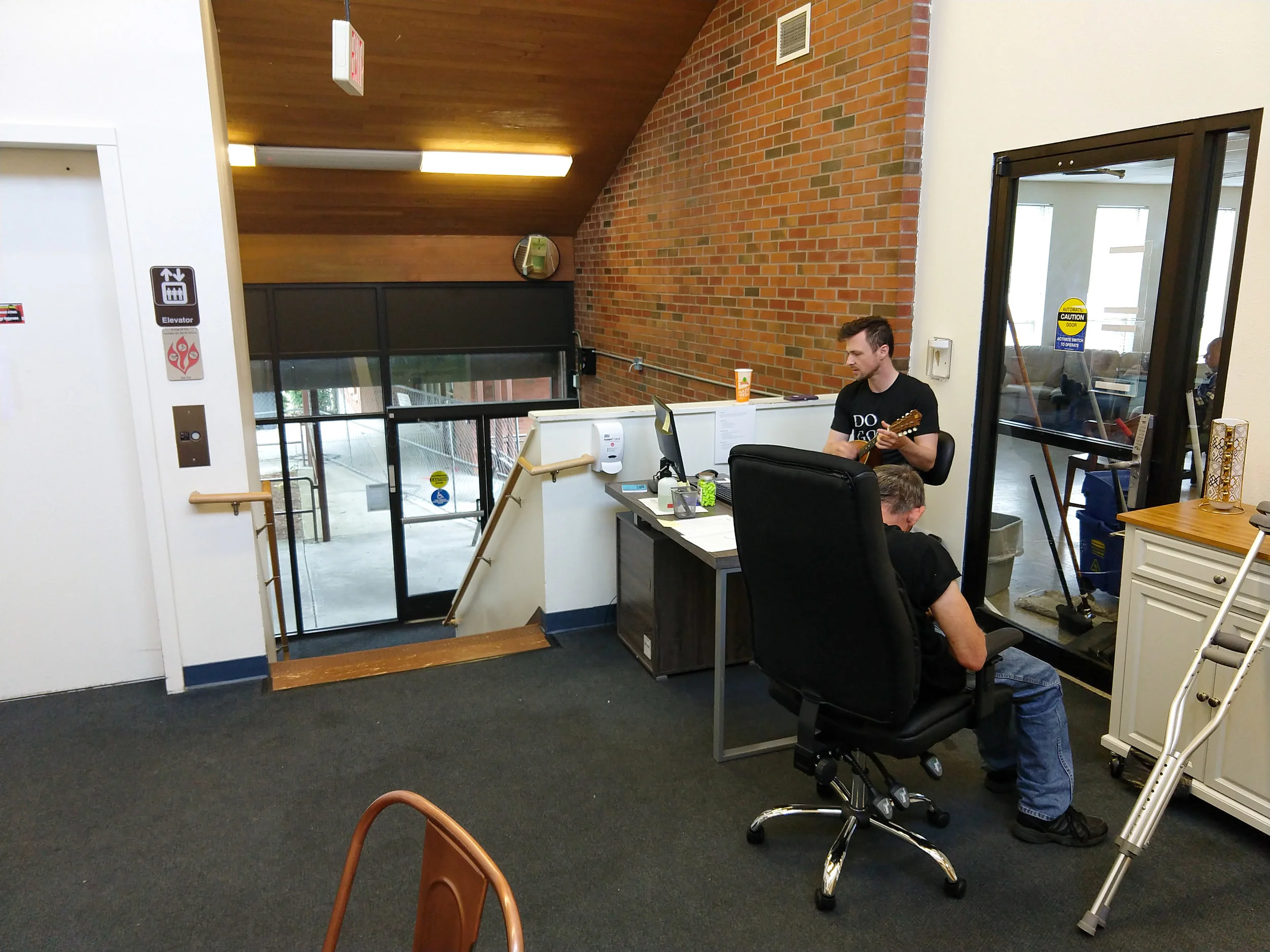 Our lobby area with Marcus entertaining participants with some Beatles on the mandolin.