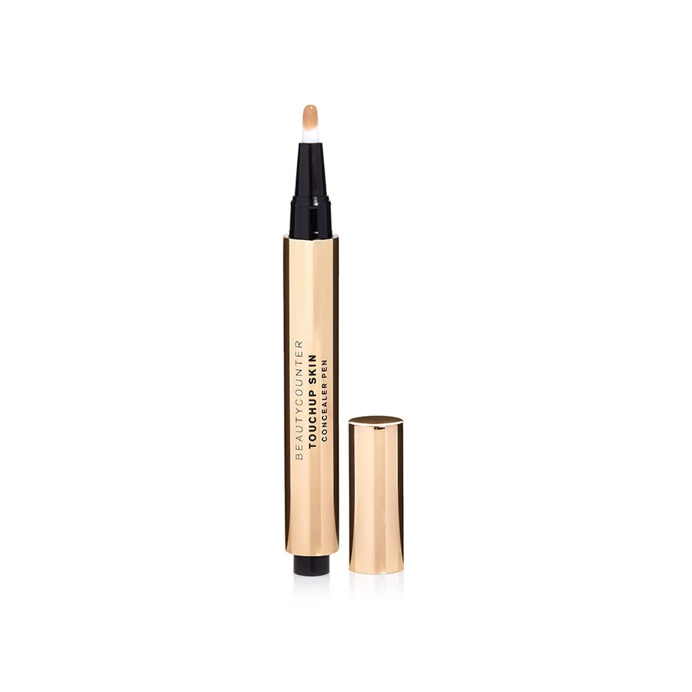 TOUCHUP SKIN CONCEALER PEN This super-clean, non-toxic, creamy, clickable concealer pen works as well for under-eye circles as it does for blemishes. The shades blend beautifully with practically every skin tone, and the formula miraculously erases flaws yet leaves an gorgeously natural finish.