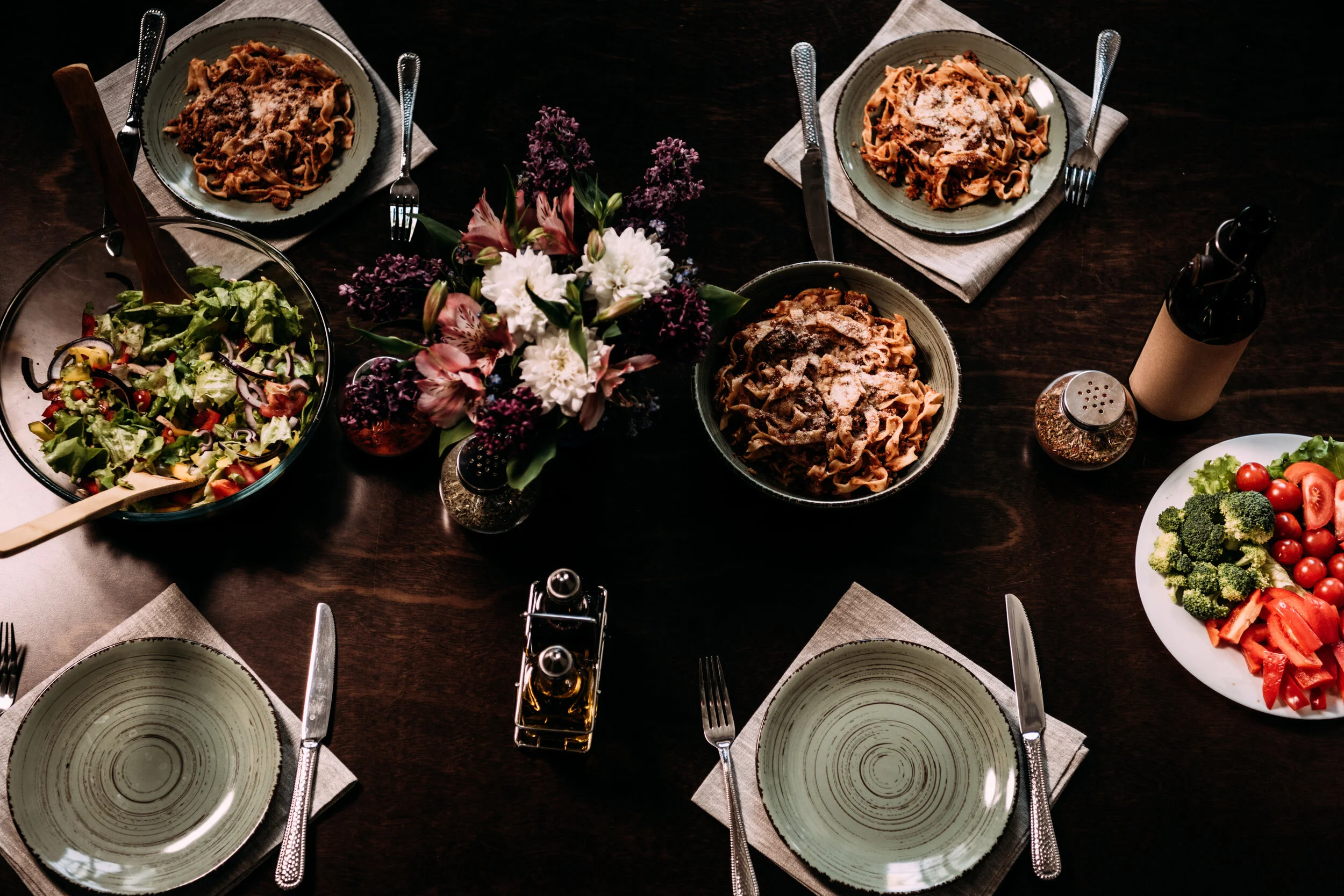 top-view-of-gourmet-dishes-and-cutlery-on-table-se-JAA4JMA.jpg