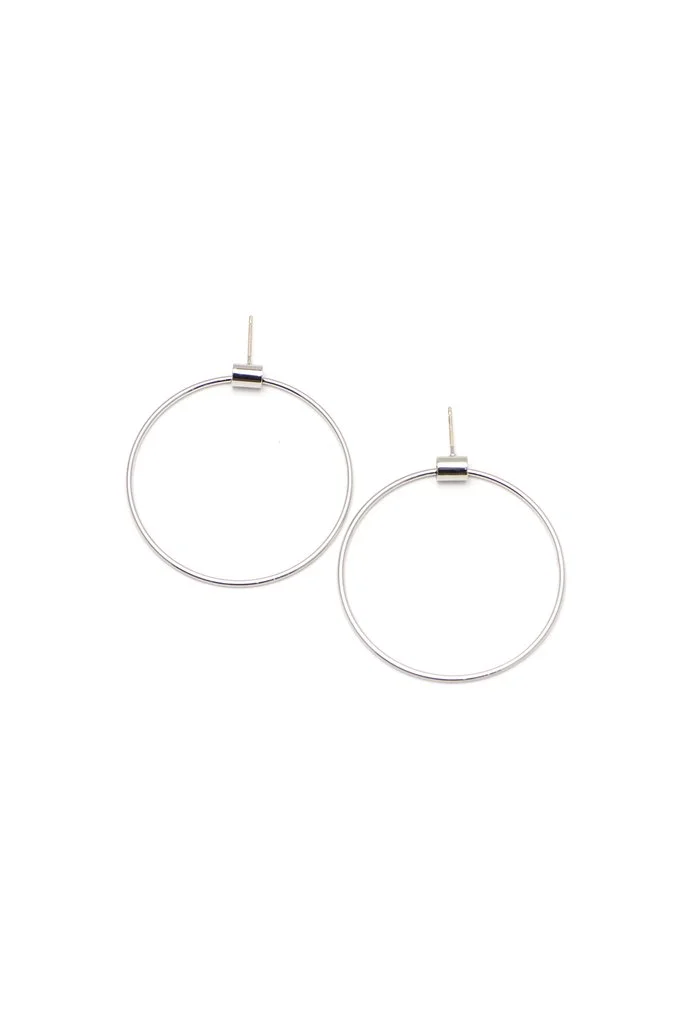 UcUKIVY8QfGDzfrA923t_Swing_Hoops_-_Large_Silver_-_Web_1024x1024.jpg
