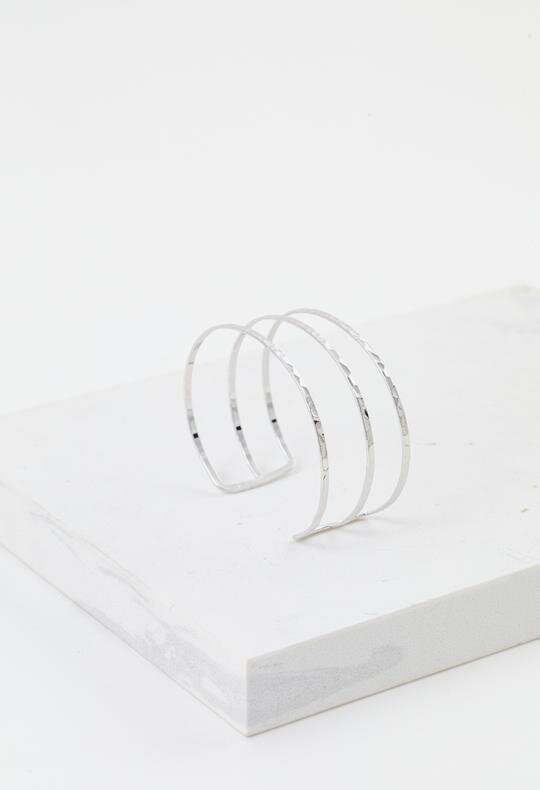 VFARQqQ2vHTQIuIaZYwP_Sayla_Hammered_Bangle_-_Silver_FLT_IND_2_WEB__1_540x.jpg