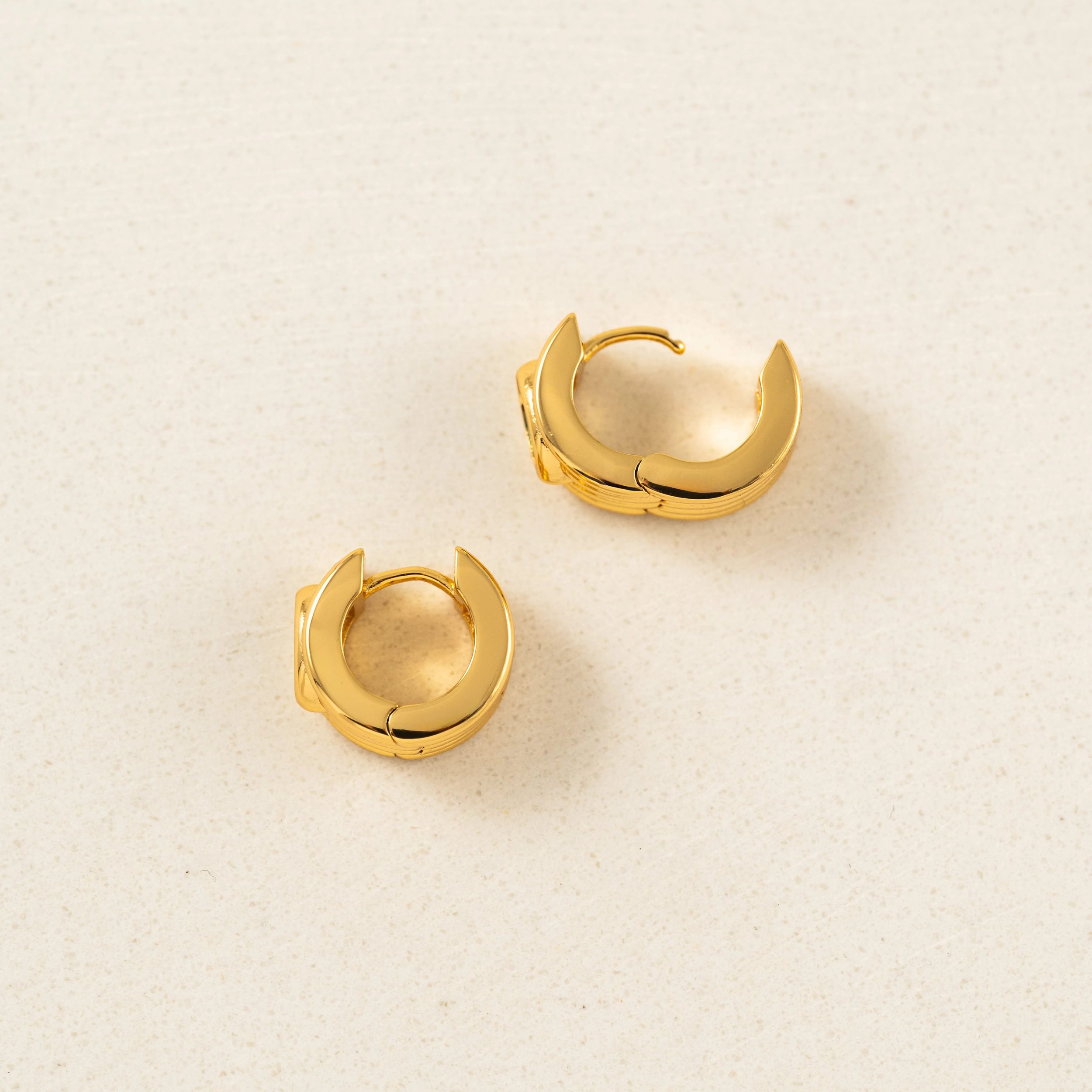 imgi_808_Marquise_Groove_Hoop_Earrings_-_Emerald_1x1_DSC2879-Edit-2.jpg