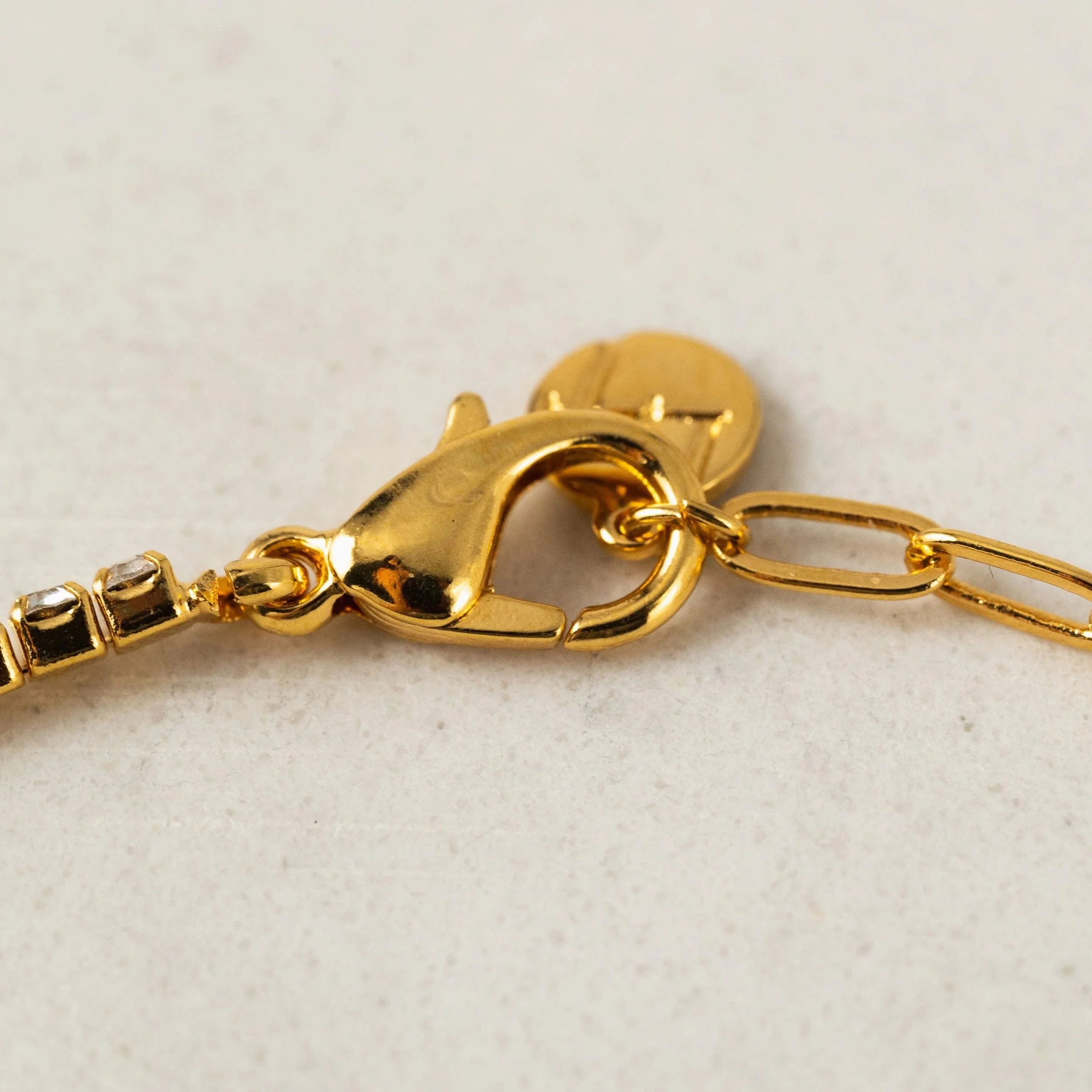 imgi_1_TennisPaperclipBracelet-Clear_1x1_DSC7219_5dfc8fad-7c00-4caf-93b7-a4c5b859068d.jpg