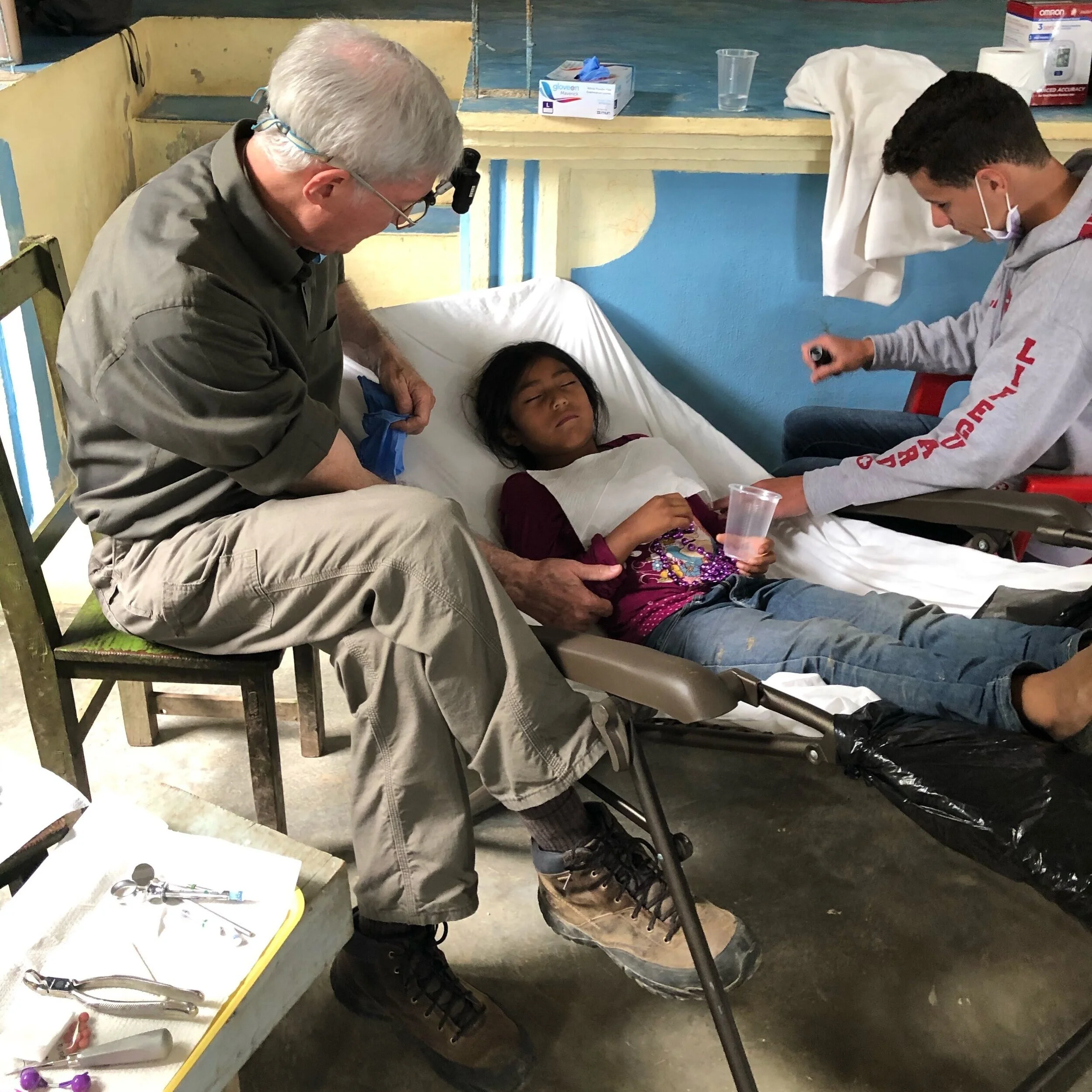 Dr. Jim with a patient during his most recent trip to Mexico