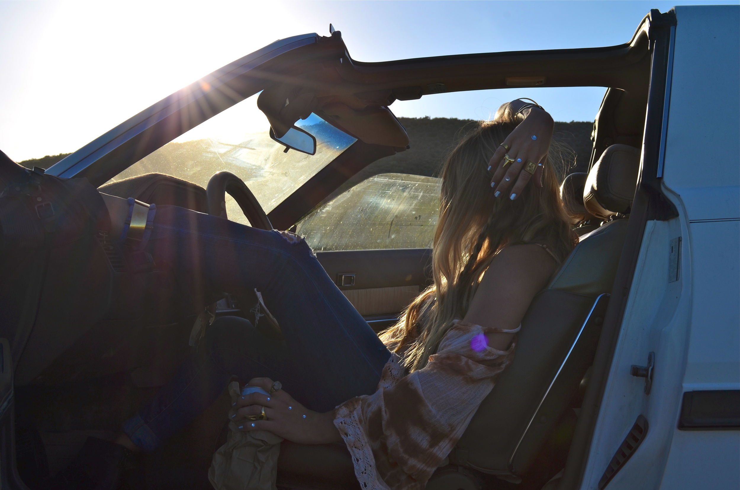  And right in the middle of chasing the sun... our car started to putter and all the plans for our brief ride to freedom started change, all in the midst of a breath. A breath we couldn't catch for a moment due to the car-explosion-movie montage dancing in our heads. Following 3 rounds of The Chinese fire drill we gracefully pushed the car 5 miles up hill - both ways - in the snow to its (could be) final resting spot in a beautiful field of mustard flowers. Okay, maybe no snow, we do live at the beach :) ... but the car was dead.