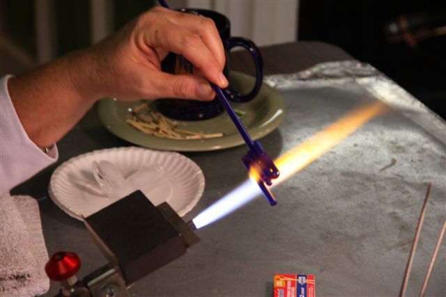 Building up a paddle of cobalt glass. White glass will be added.