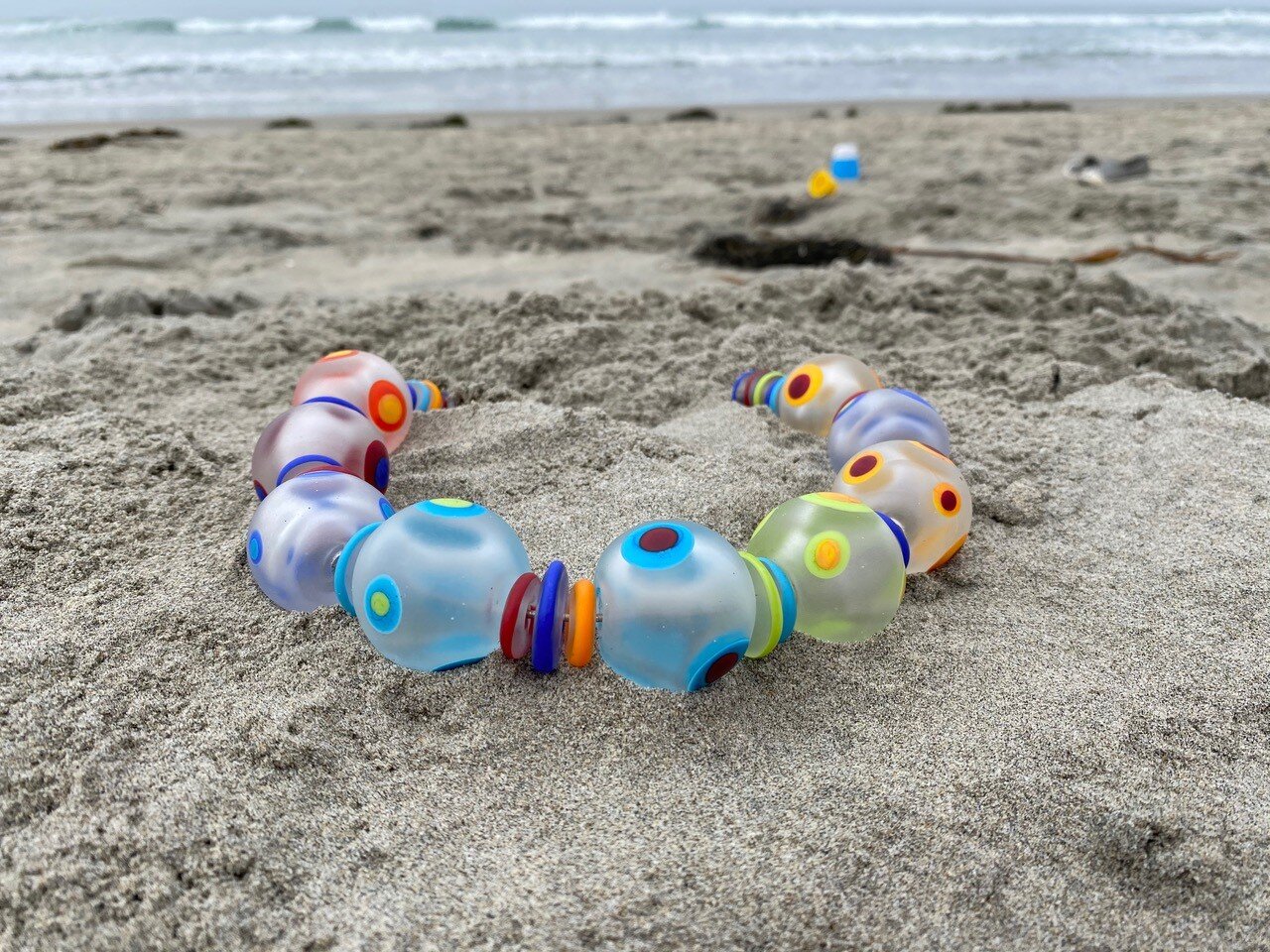 HT-tumbled bead necklace at the beach.jpg