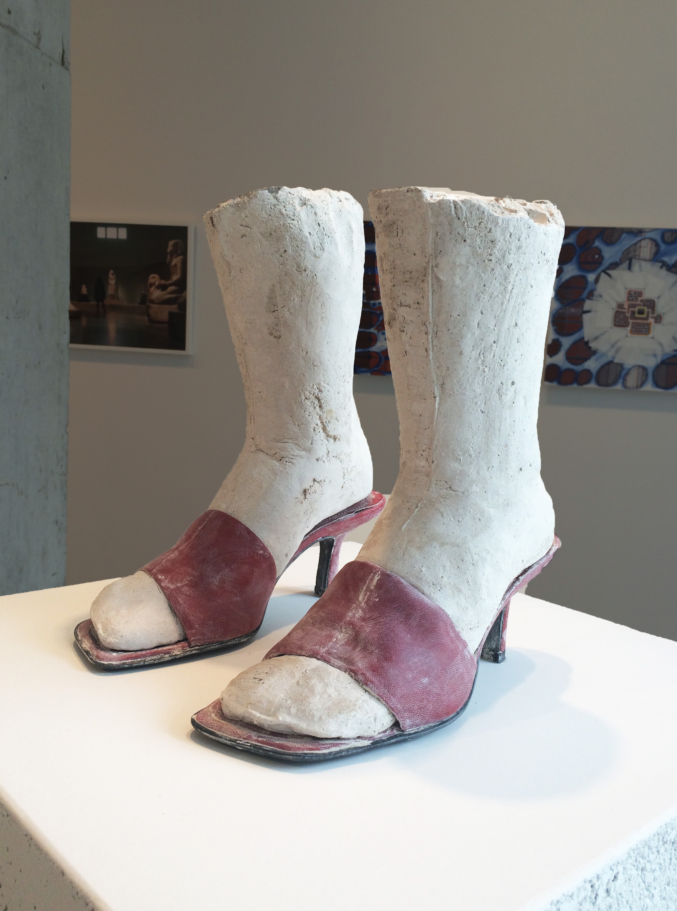   Ashley Lyon   Choir (red),&nbsp; 2010-2014 unfired clay, plaster, shoes 12 x 12 x 12 inches 