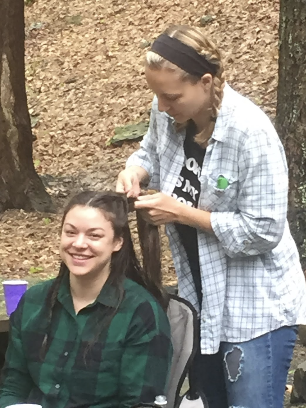olivia and sara enjoying some time in the woods at hedgepig's first retreat.
