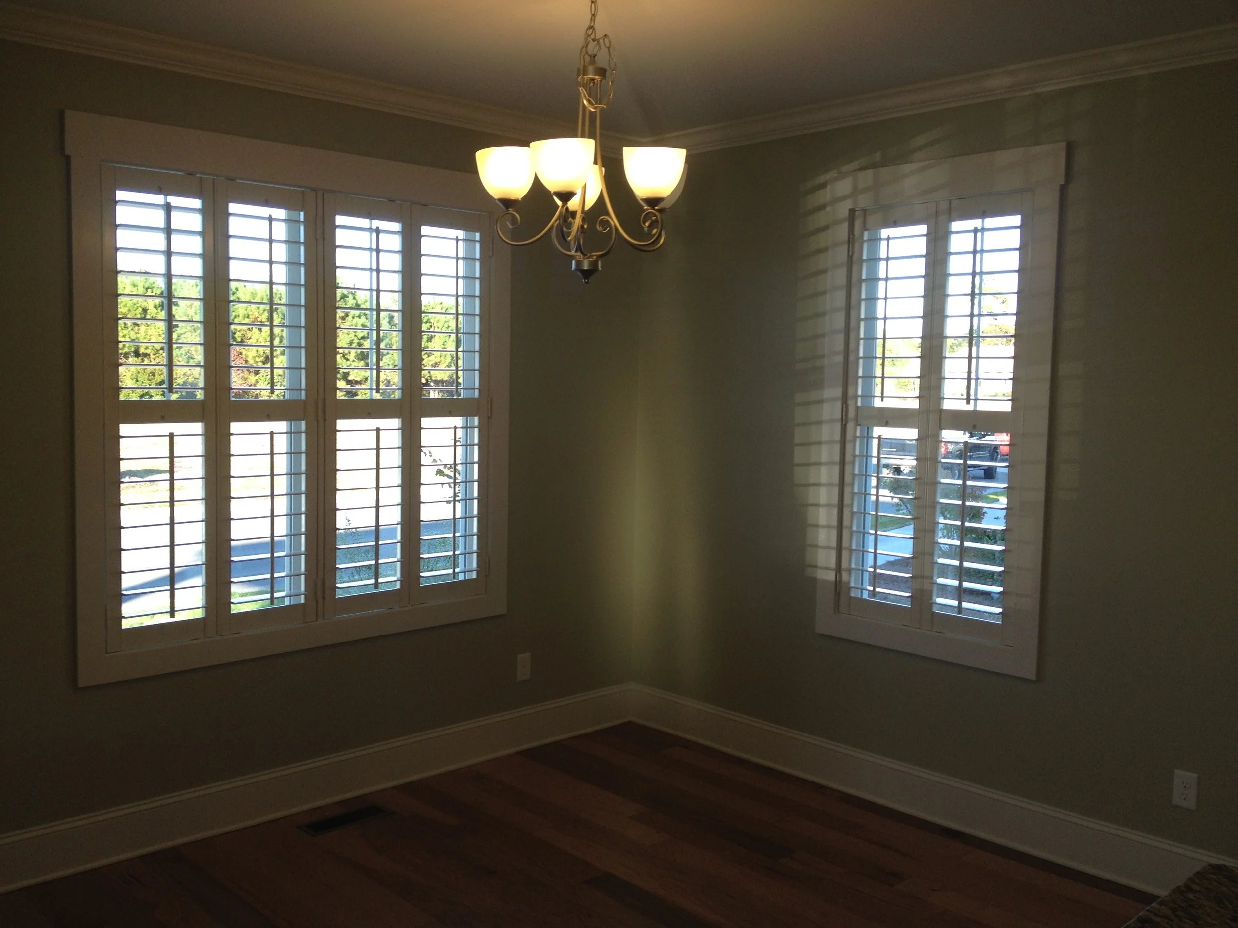 Double window with T post and four shutter panels.JPG