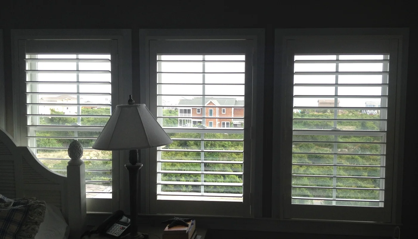 Plantation shutters with 3.5 louvers and single panels.JPG