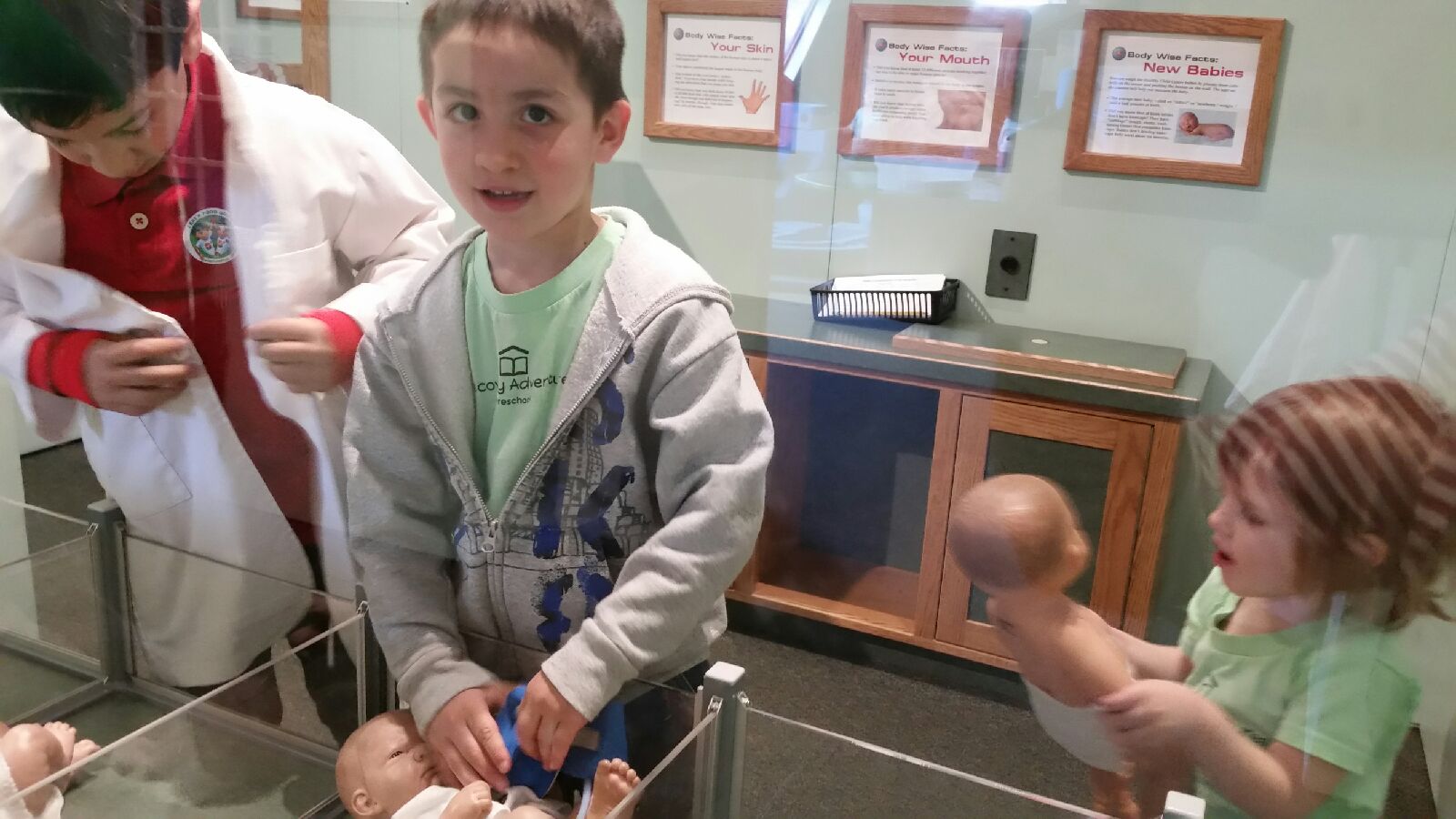 Doctors Helping at the Doll Hospital