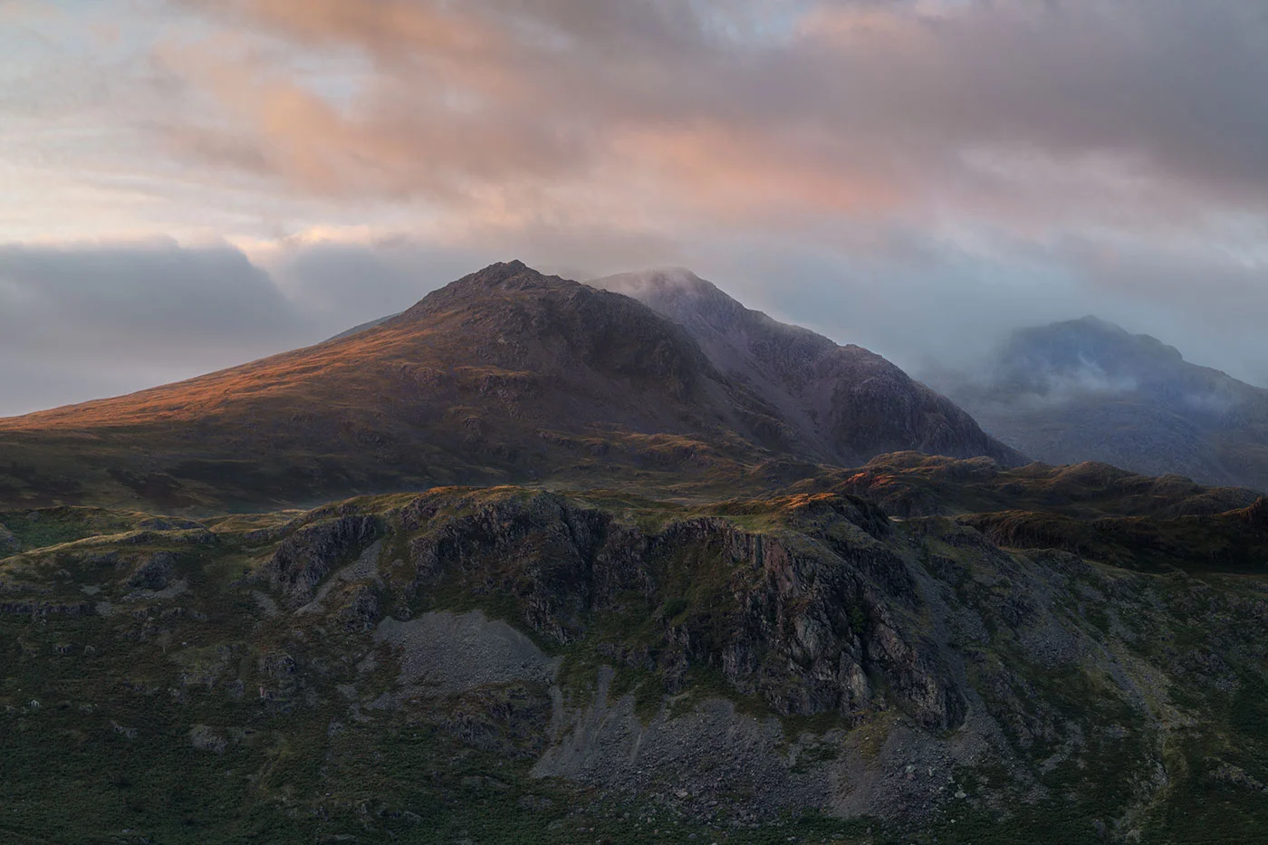 Looking-across-towards-Brock-Crag-and-Round-Scar-as-the-sun-descends.jpg