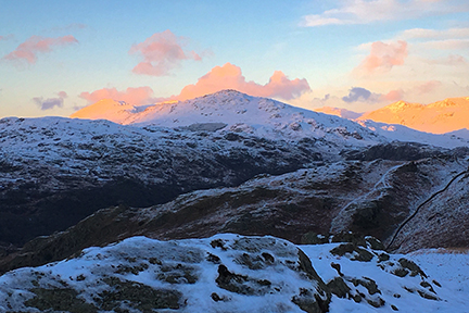 iPhone Image of the sunset with Harter Fell in shadow but the full glow of the sun on Bow Fell