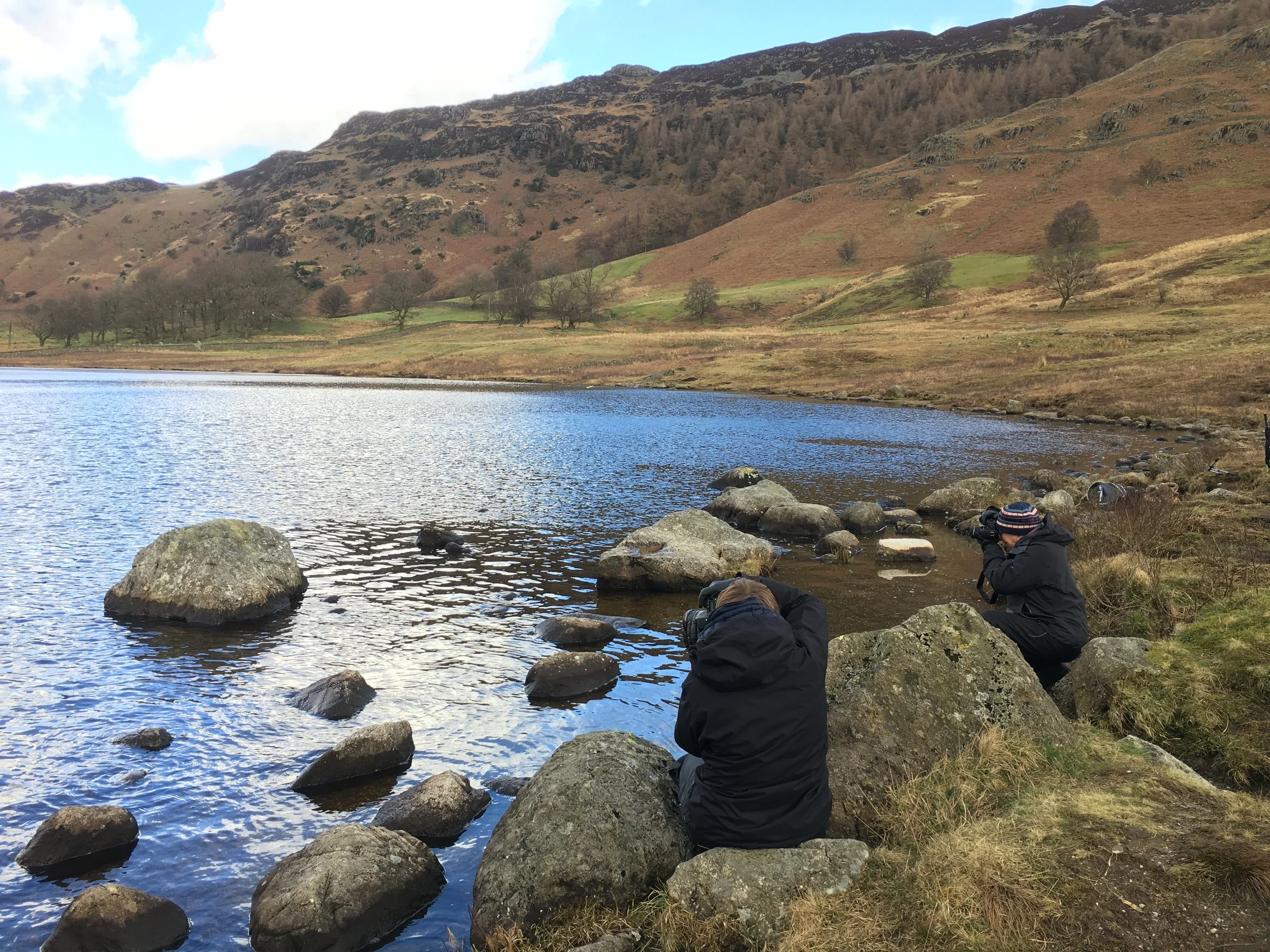 Julie and Jenny enjoying a 'sunshine break' by Blea Tarn. Didn't last long....