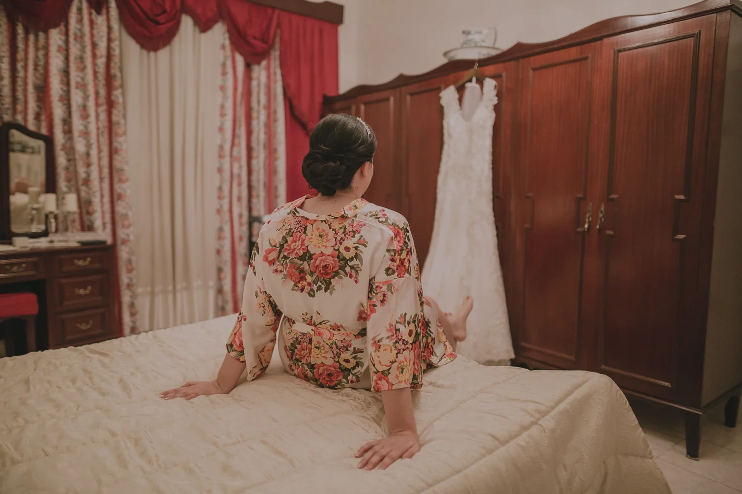 Playful Cherise looking at her wedding gown