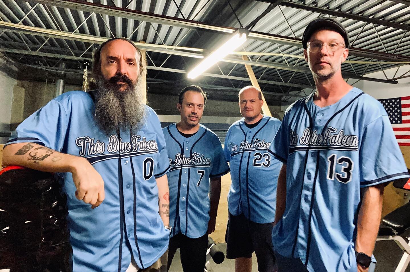 The lineup: Lamb 0, Wolf 7, Crim 23, Space 13 #thisbluefalcon #tbf #bandphoto #men2boyz #livemusic #concert #jerseys #lineup #musicians #grownmen