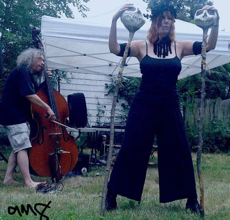 Photo of our performance "Cosmic "Shadow", with Jimi Durso (music) and Robyn Bellospirito (dance). Photo by Andrea M. Gordon.
