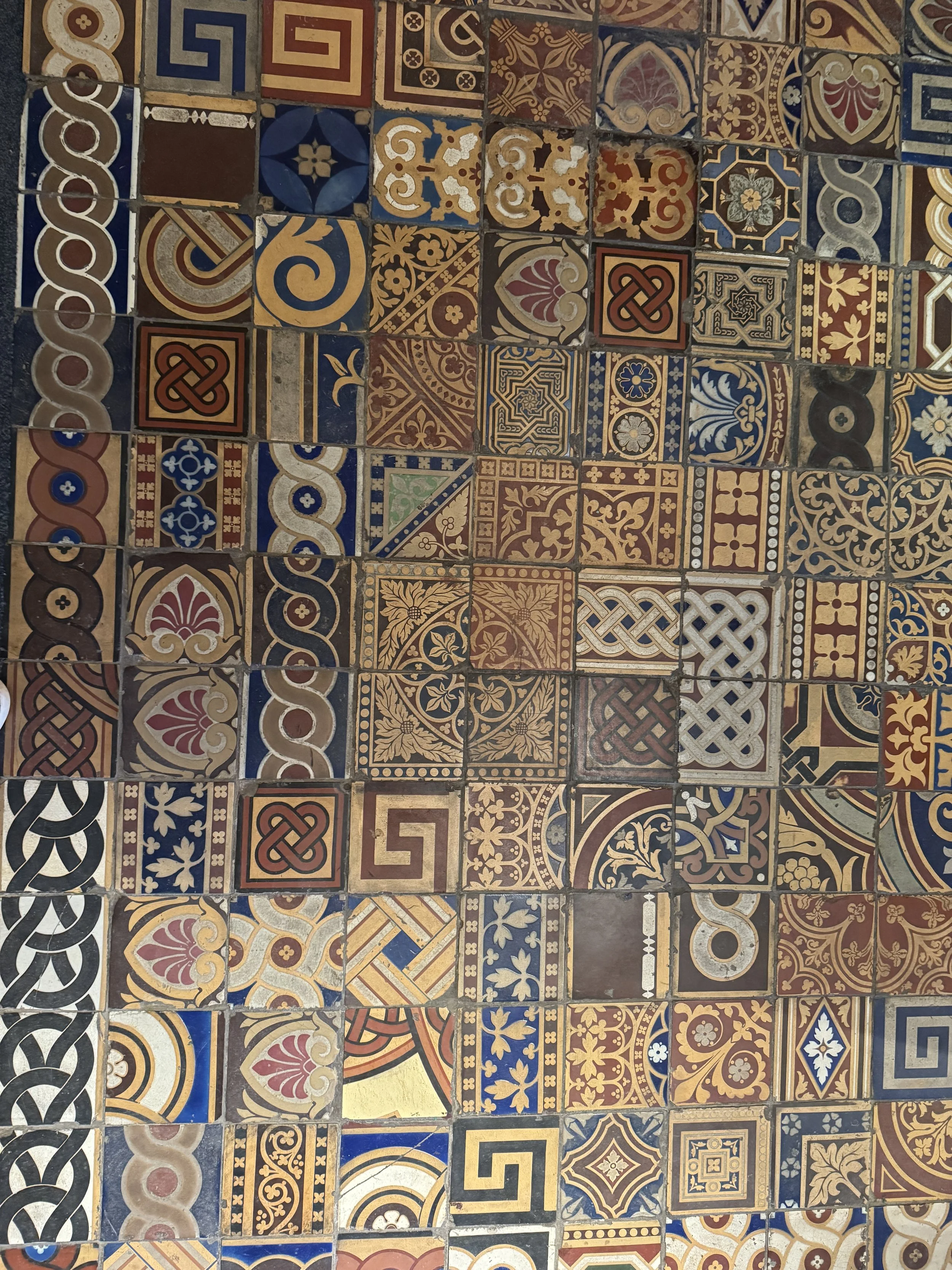Wall of colourful Victorian decorative tiles, Gladstone Pottery Museum