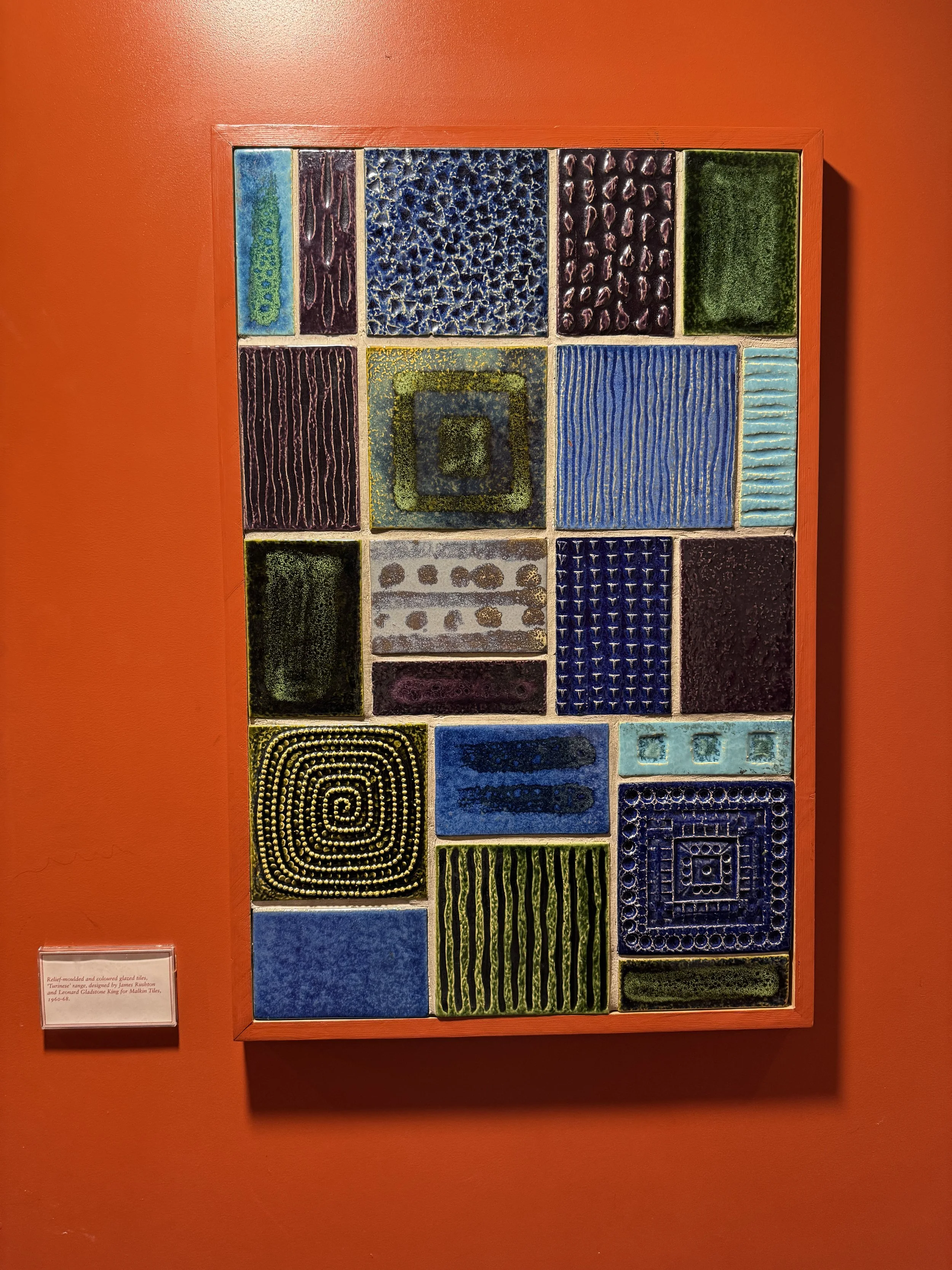 Panel of textured glazed tiles in blues and greens, Gladstone Pottery Museum