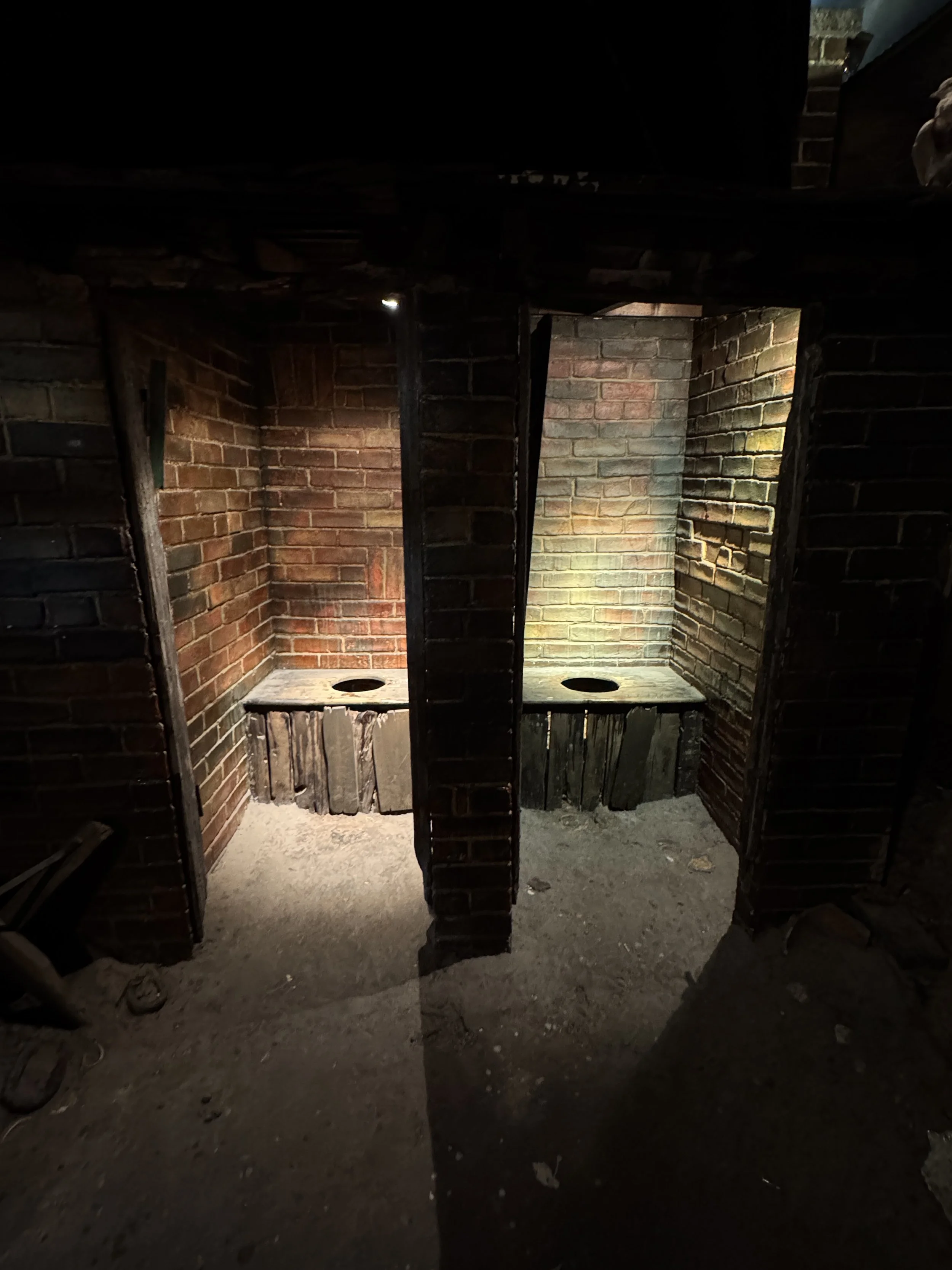 Recreated brick privies in the bathroom history exhibition, Gladstone Pottery Museum