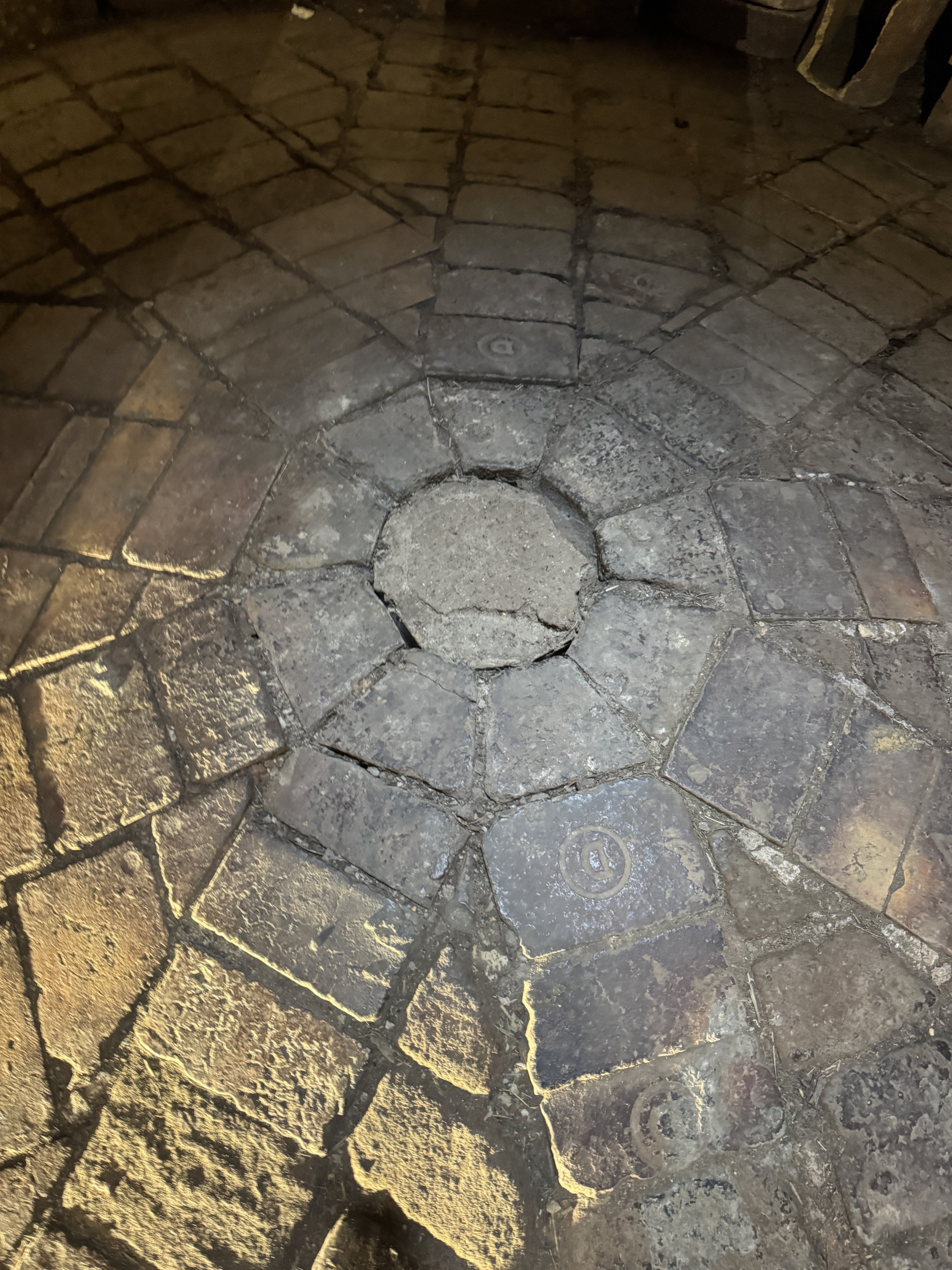 Worn brick floor inside a bottle kiln, Gladstone Pottery Museum