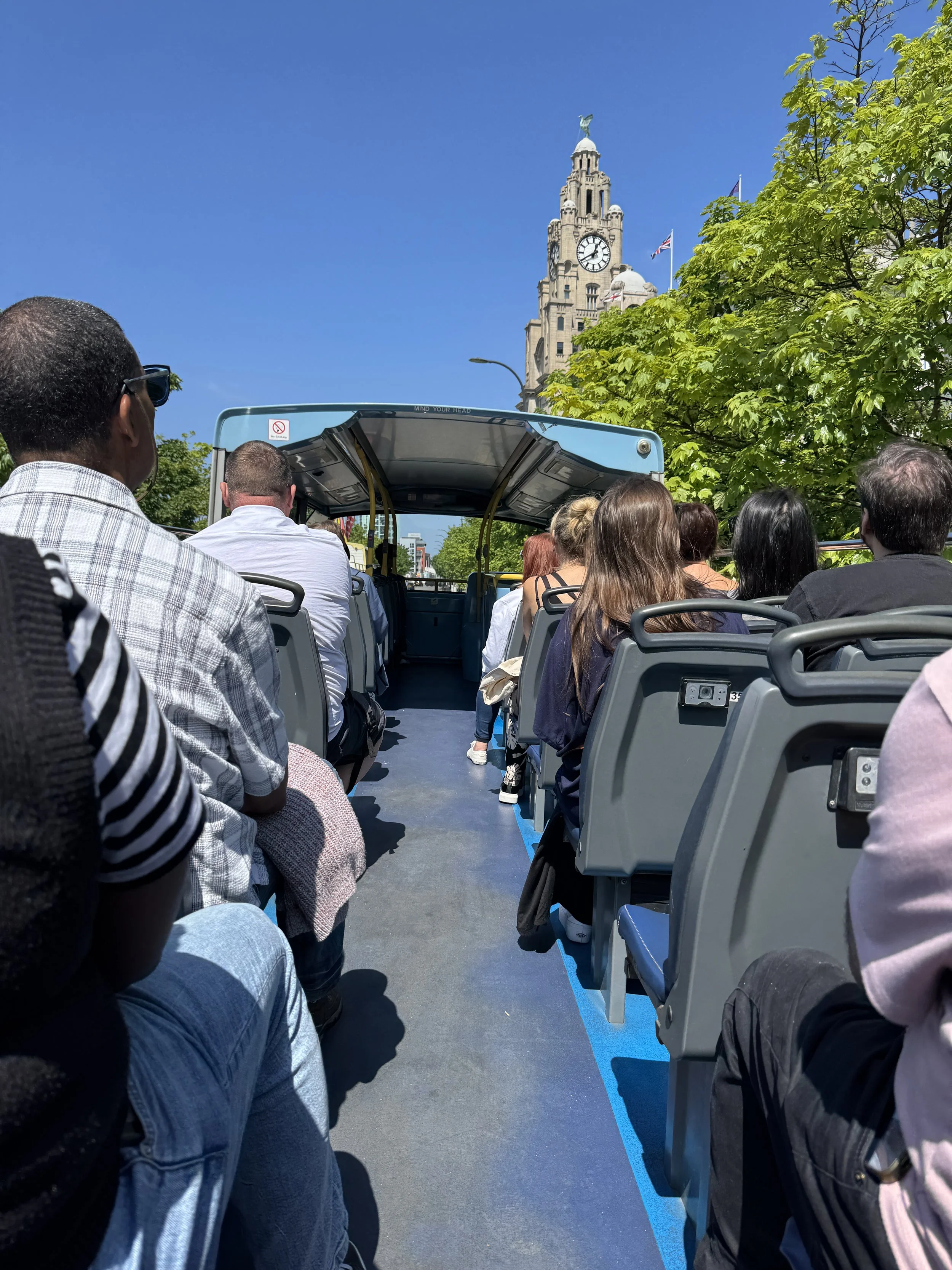On board an open-top bus tour of Liverpool