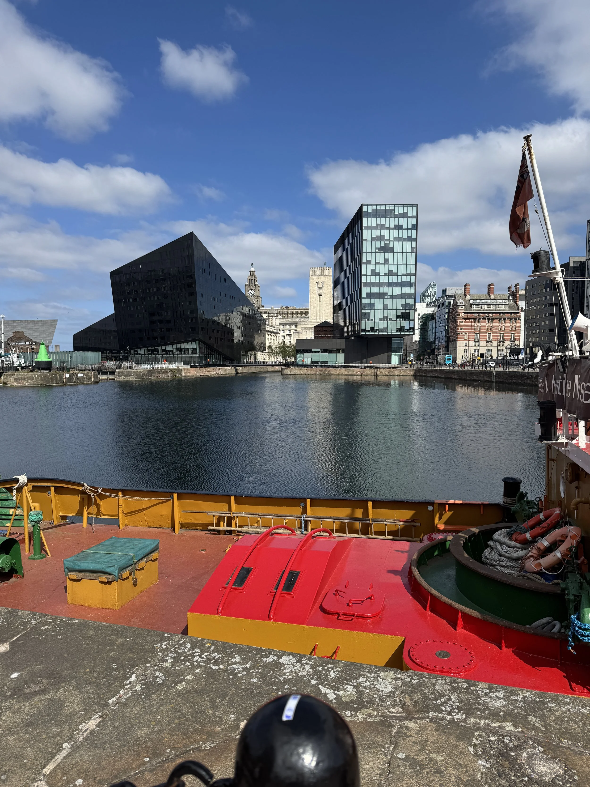 Royal Albert Dock waterfront in Liverpool with a colourful art installation