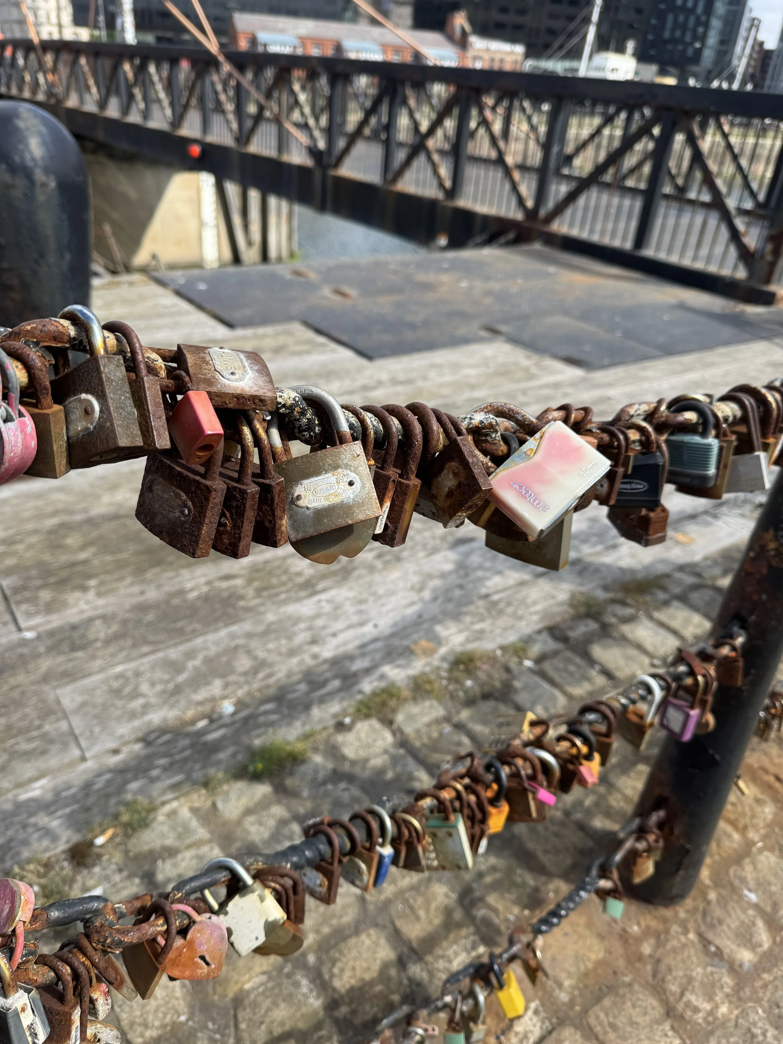 Love locks on the dockside railings, Royal Albert Dock, Liverpool