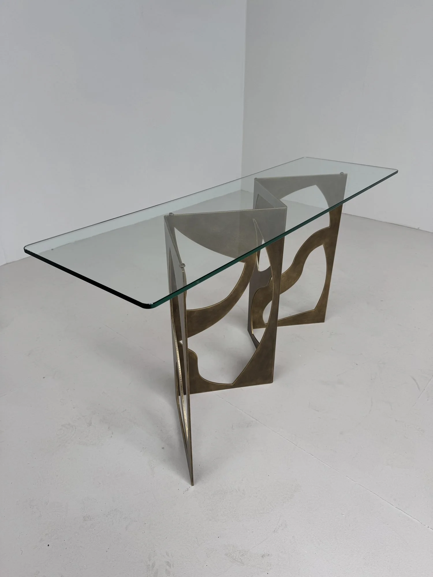 Eclipse console in antique bronze, side view