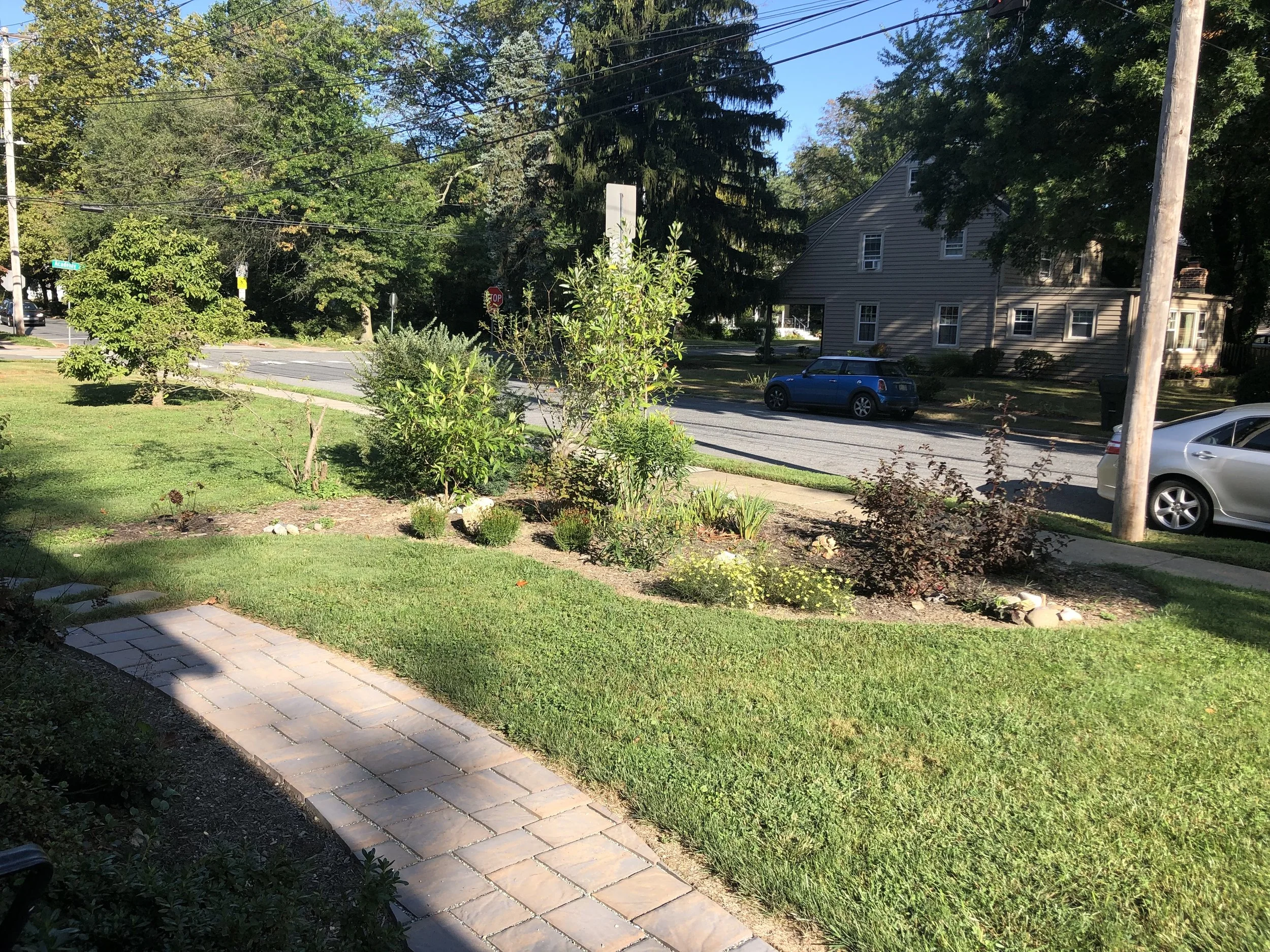 04_After_PermeablePaverDriveway.jpeg