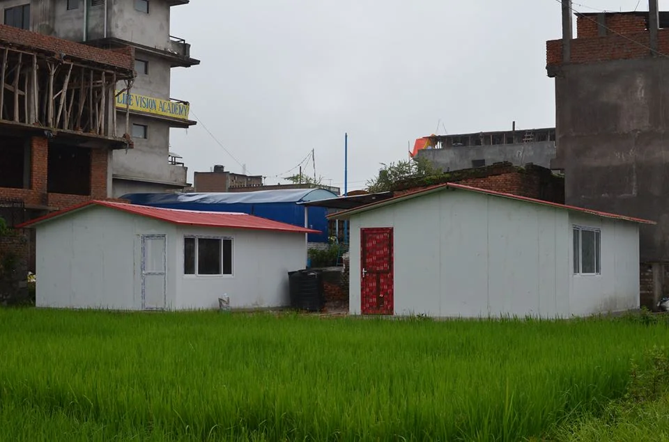 We put a roof over our children's heads thanks to the support of our donors and the fabricated house company .