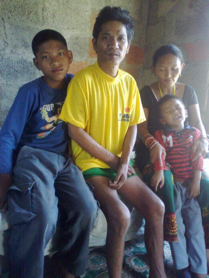 Young Anil (left) with his family