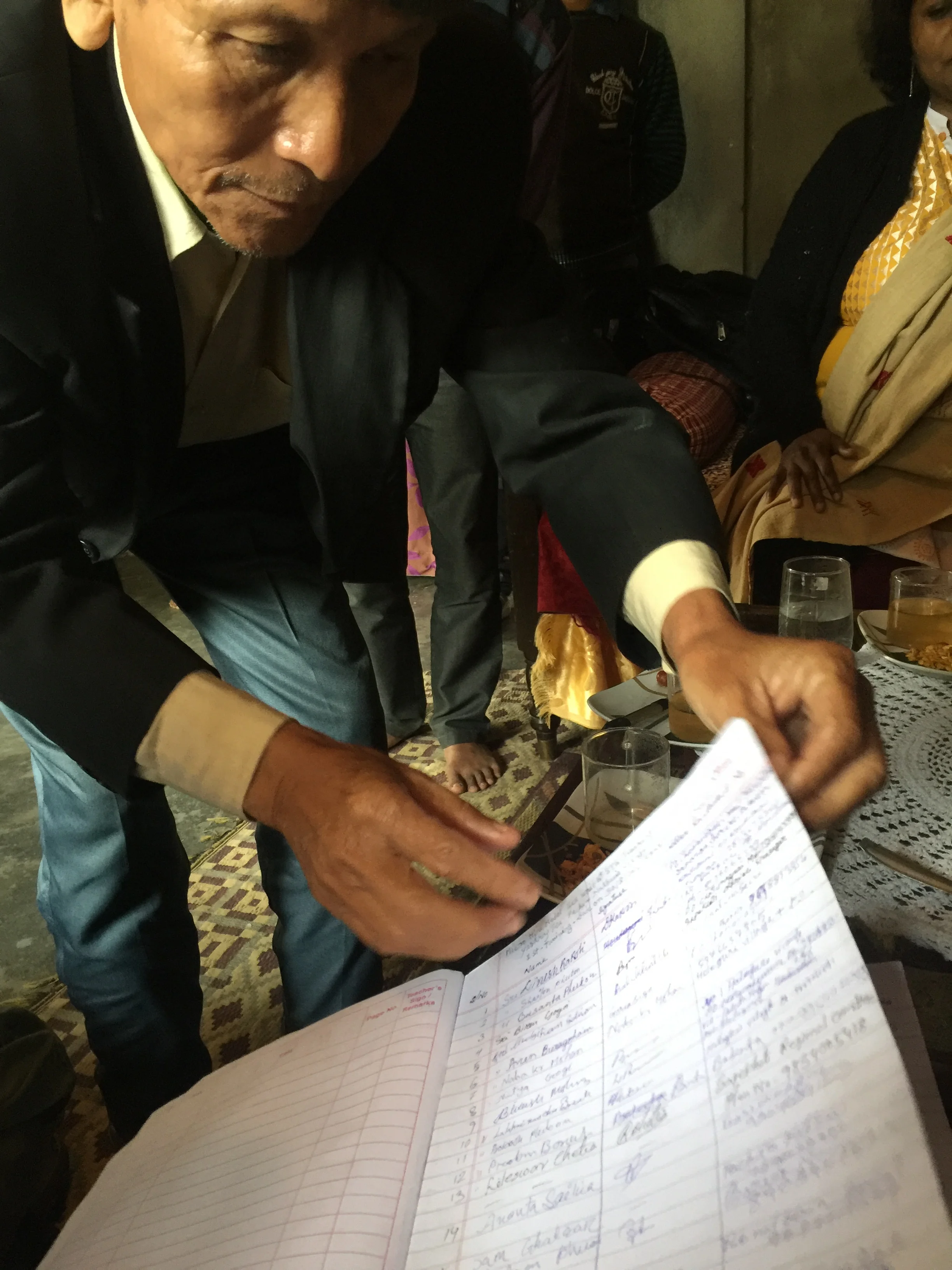 Someswar shows us the list of students who have attended his training seminars over the past year.
