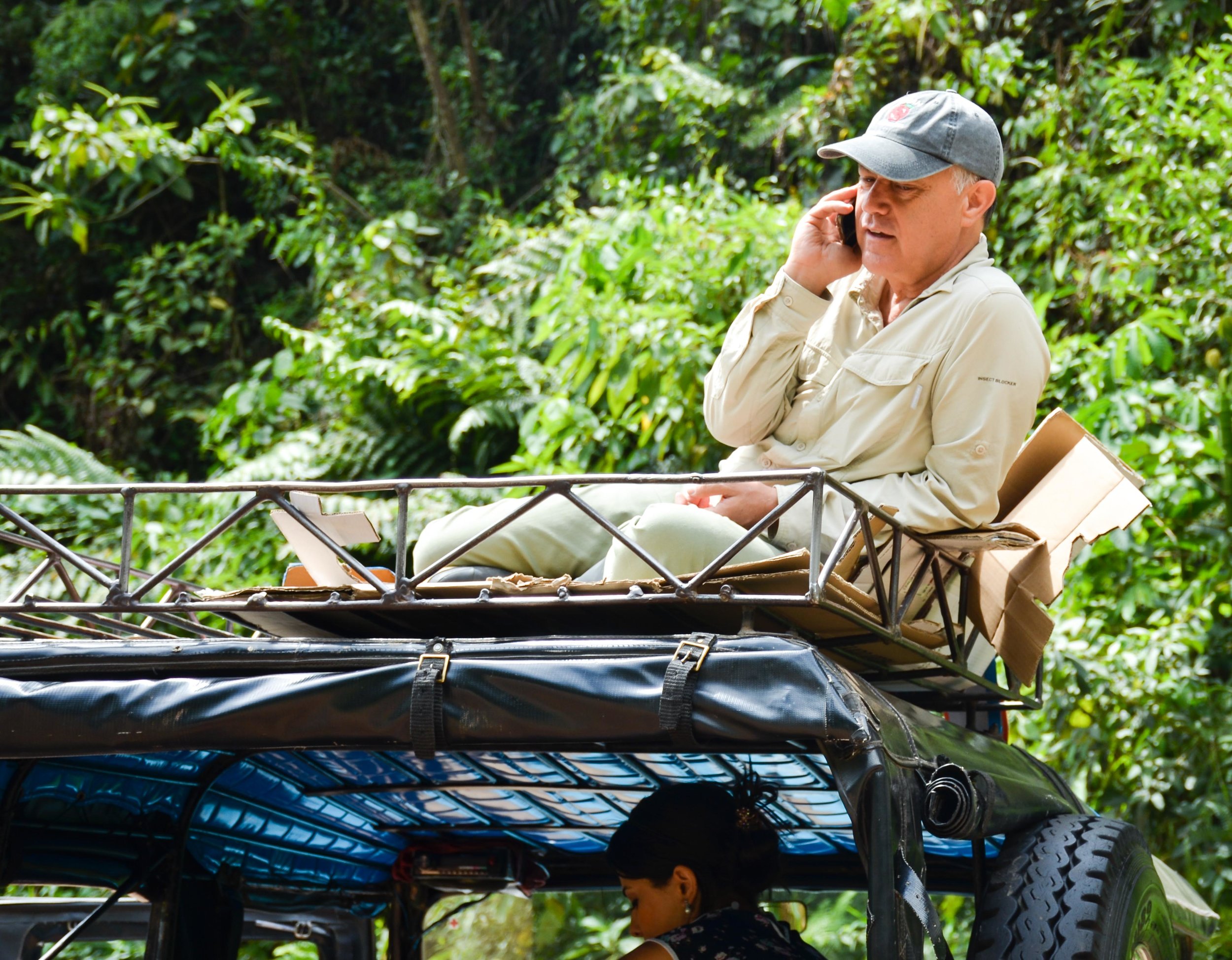 Julian working from his mobile "office" - the top of a Jeep! (check out the 'cushy' seating)