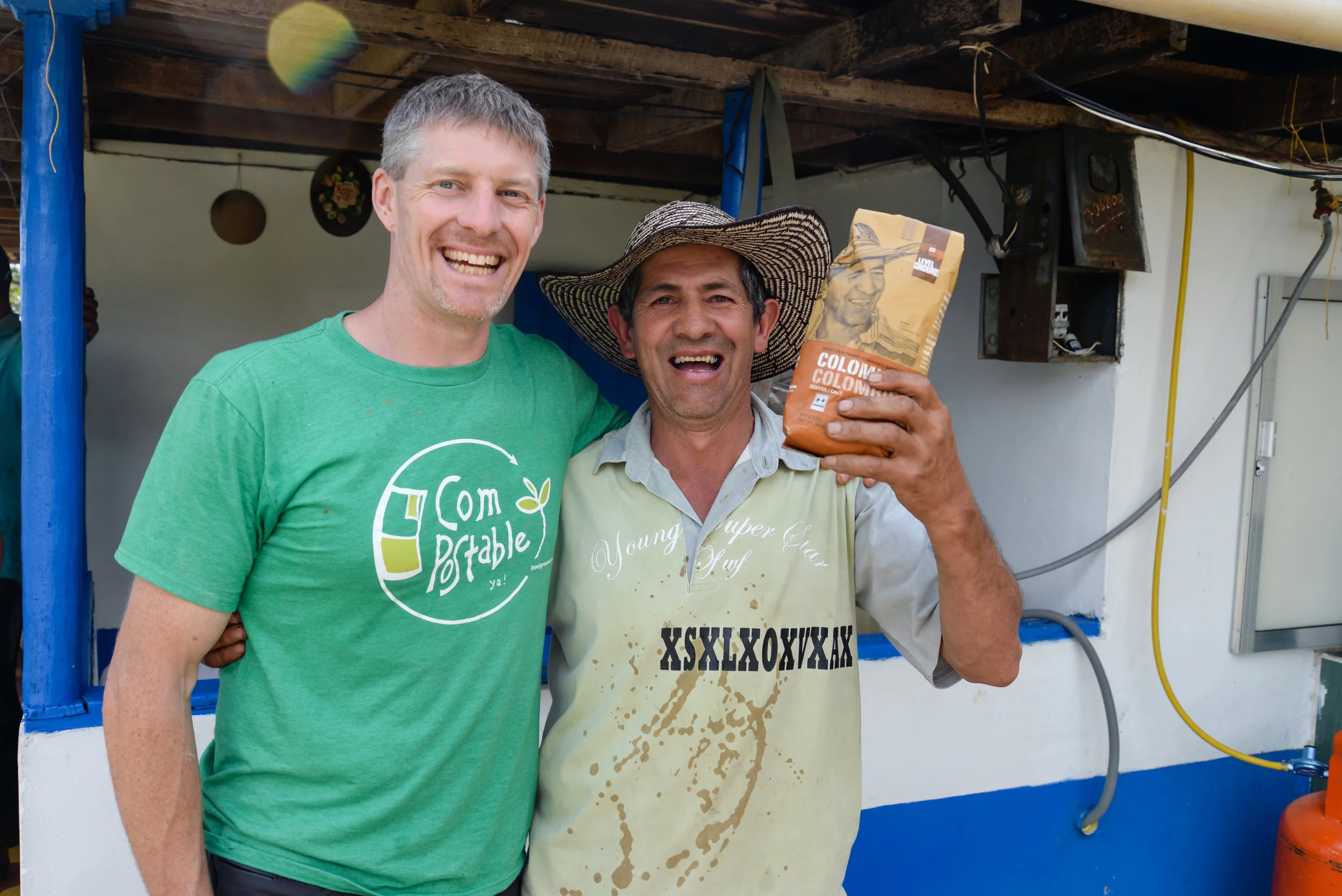 Co-owner Stacey shows Jaime his face on the Colombia coffee package for the first time!