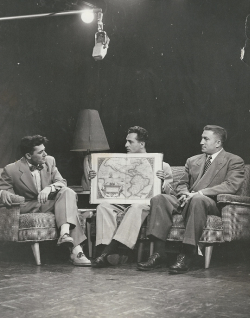 Siney B. Solomon and Henry Chafetz talking about maps. c. 1955