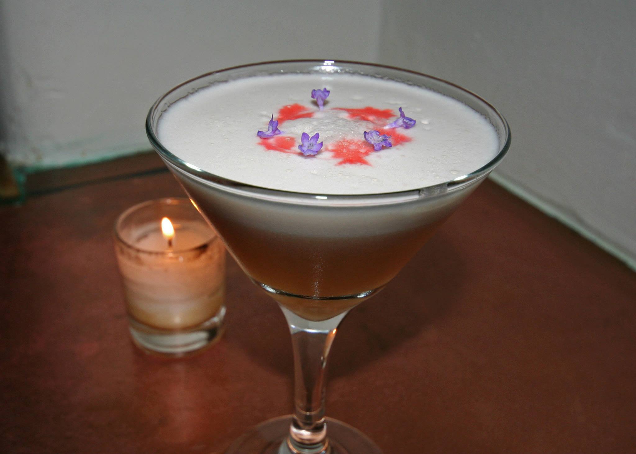 Pisco Sour with strawberry and lavender-infused Pisco Don César 