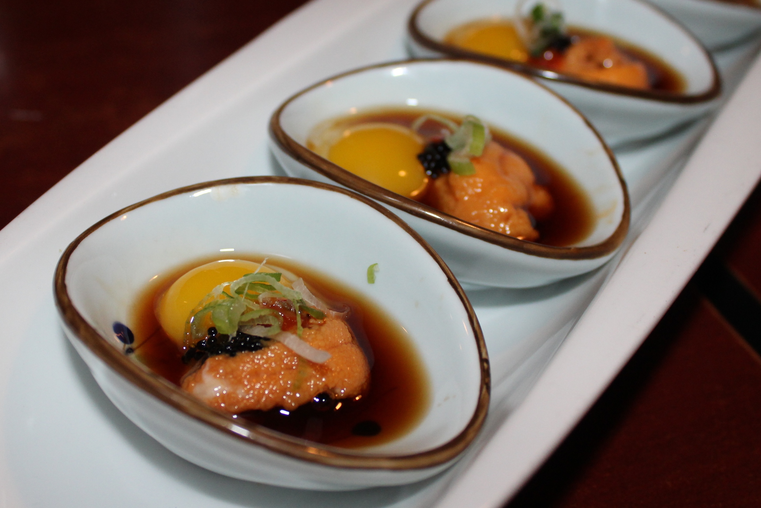 Uni shooter with quail egg and yuzu