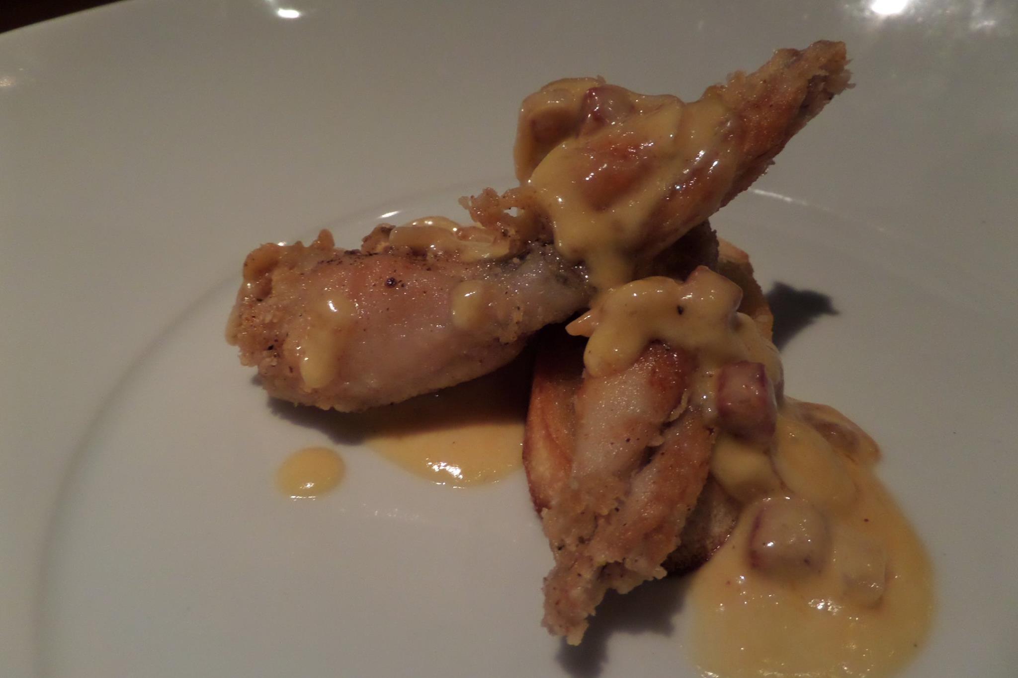 Crispy frog legs with Japanese prawns, Spanish chorizo, and sauvignon blanc buerre blanc.