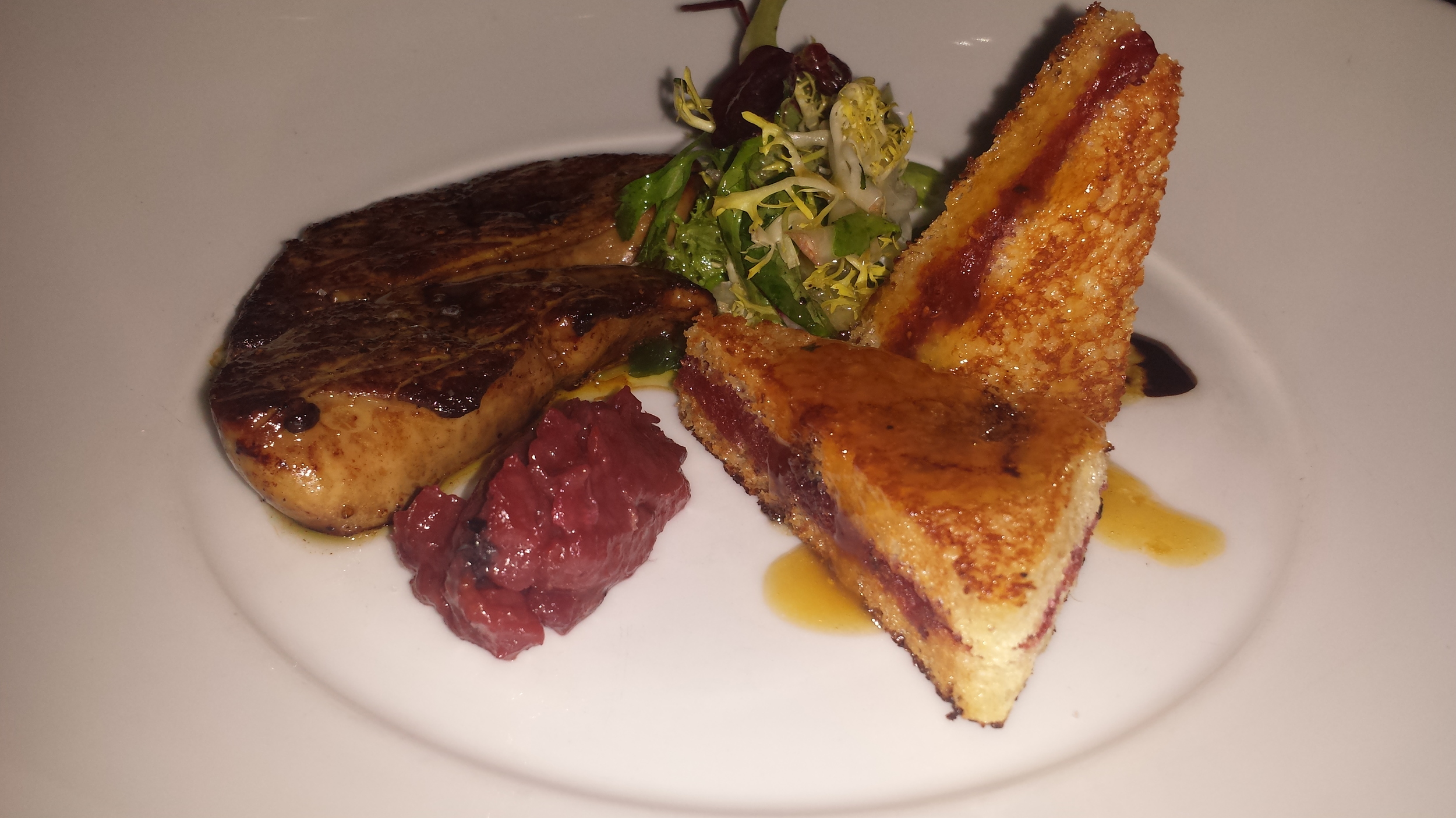 Seared foie gras with fruit compote and stuffed French toast.