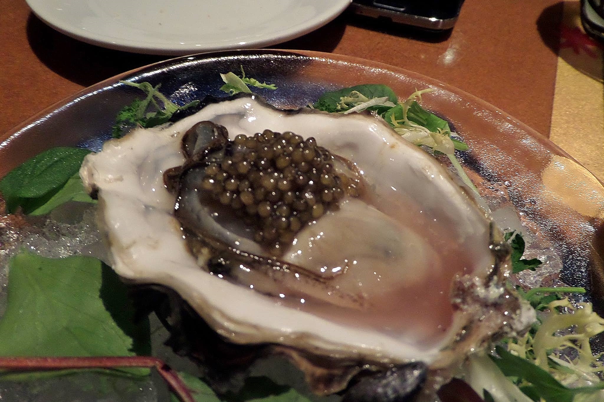 Malaspina oyster with Golden Ossetra caviar and red wine mignonette.